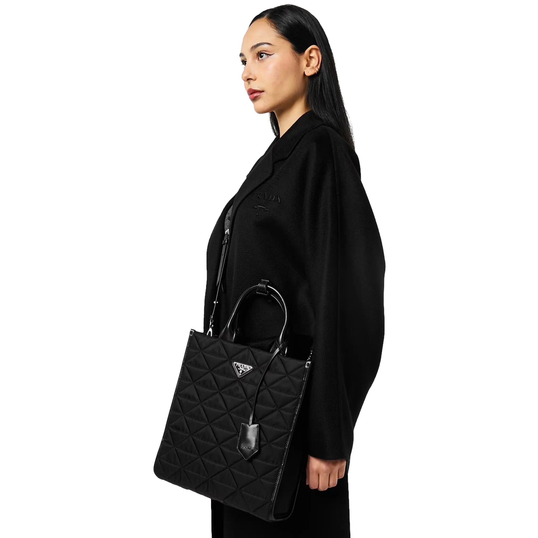 Model view of Prada Large Re Nylon Quilted Black Tote Bag 1BA391VOOM2CNY