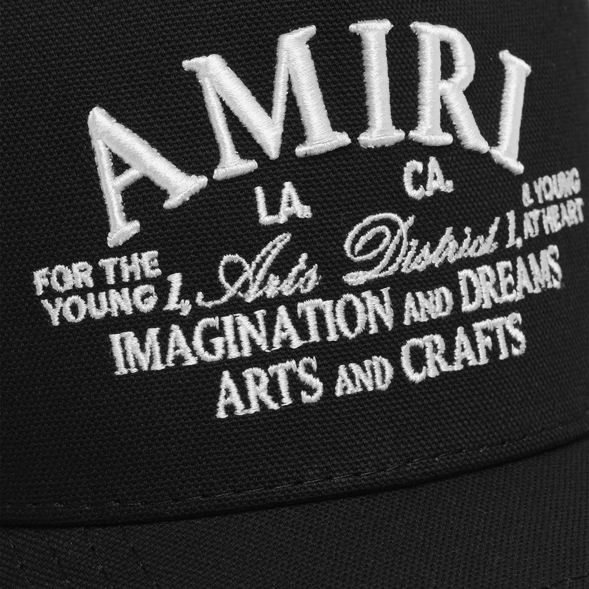 Detail view of Amiri Arts District Black Trucker Cap PXMAH001-001