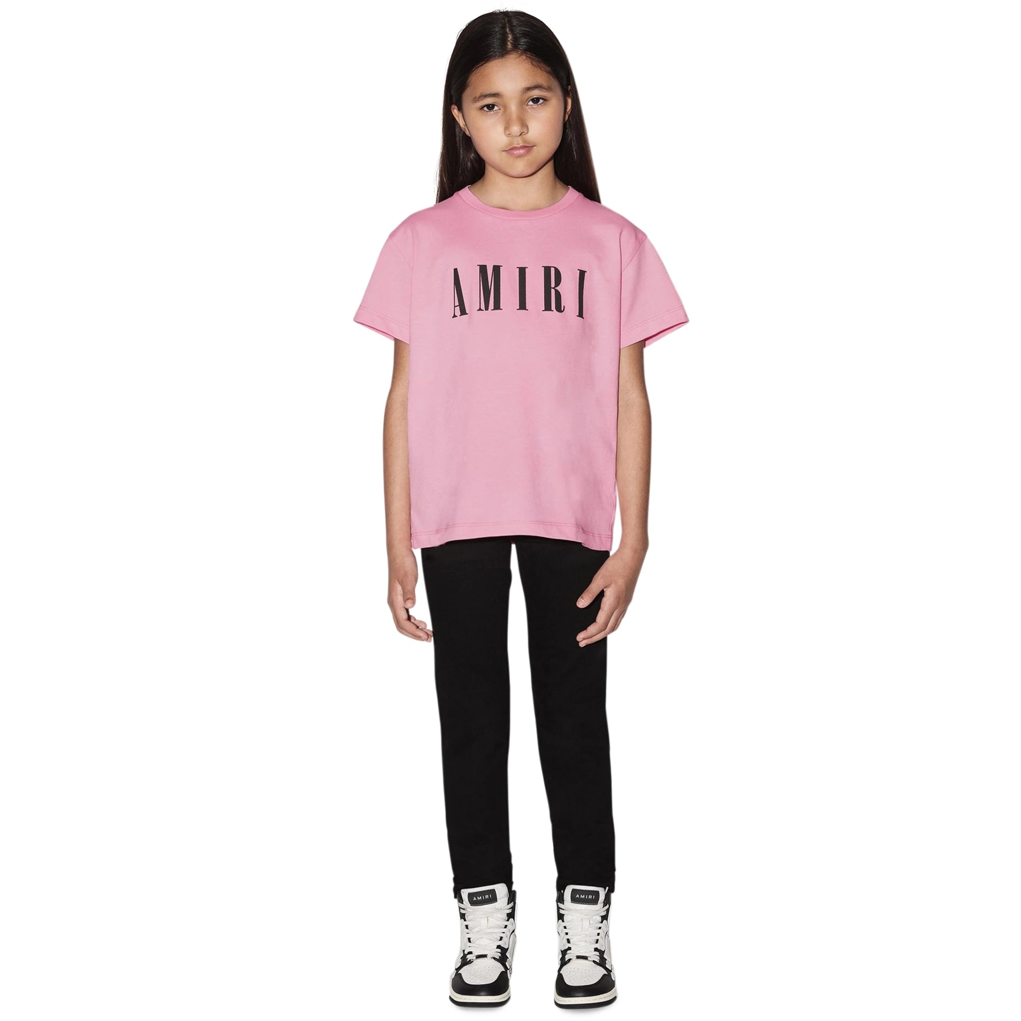 Model front view of Amiri Kids 'Amiri' Baby Pink T Shirt