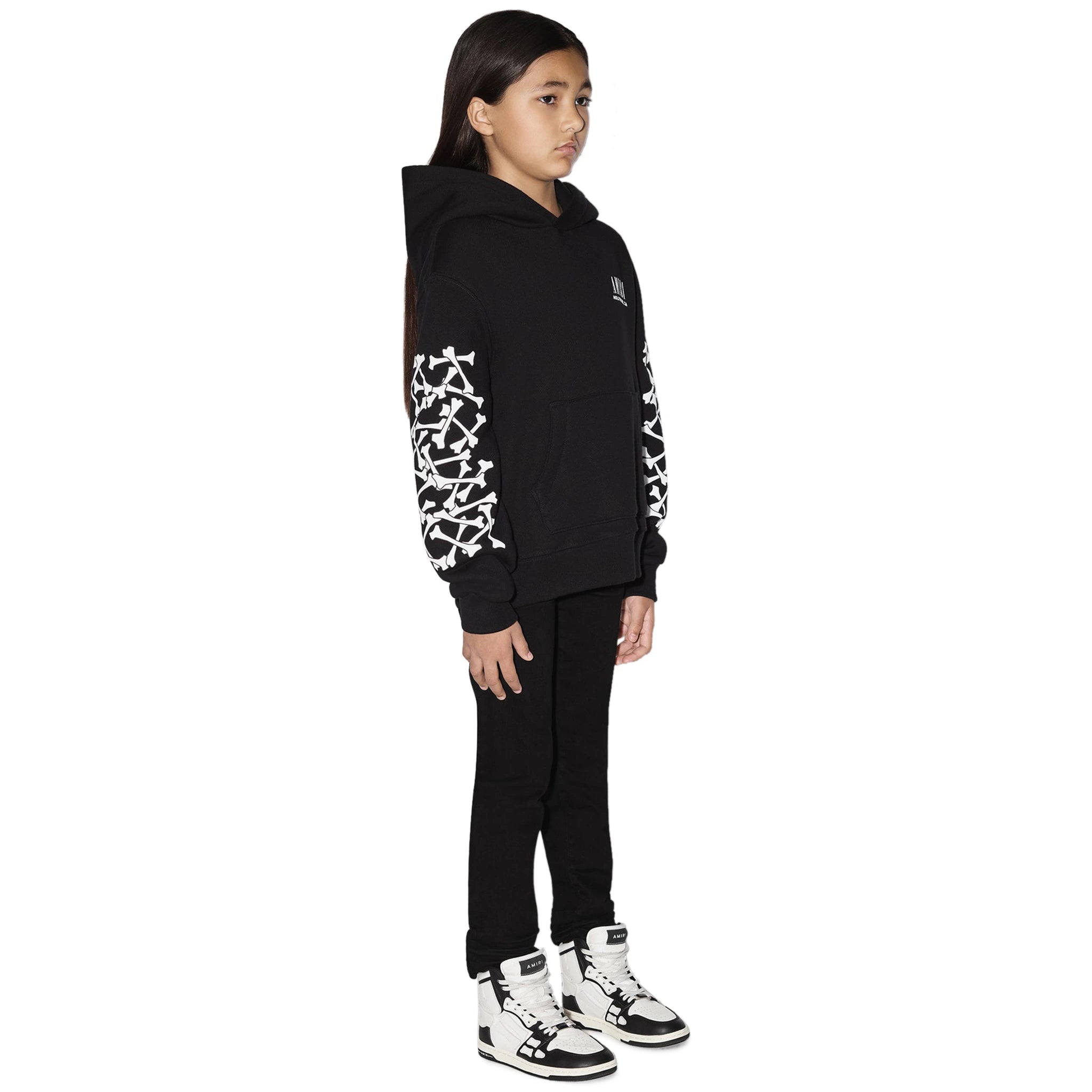 Model side view of Amiri Kids Bones Black Hoodie PF22KJL008-001