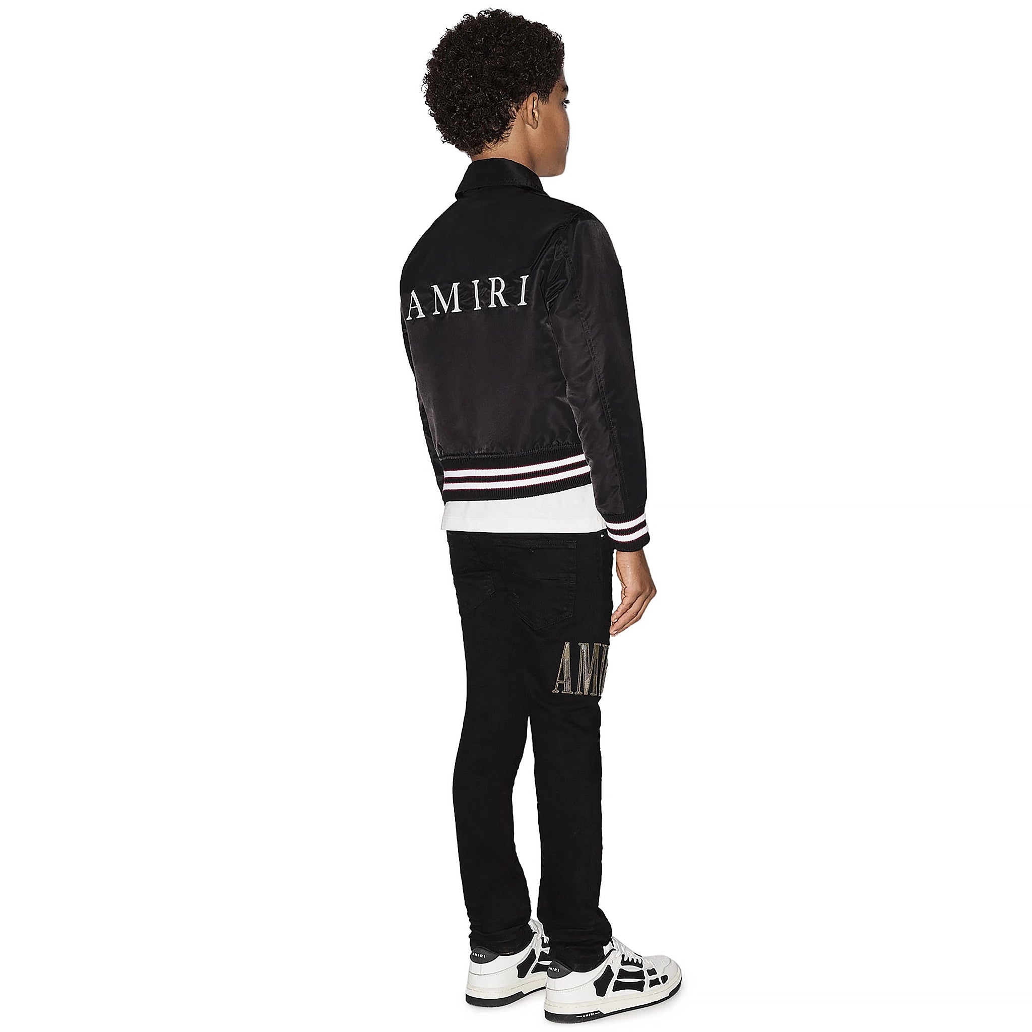 Model back view of Amiri Kids Ma Black Coach Jacket PF22KOW001-001