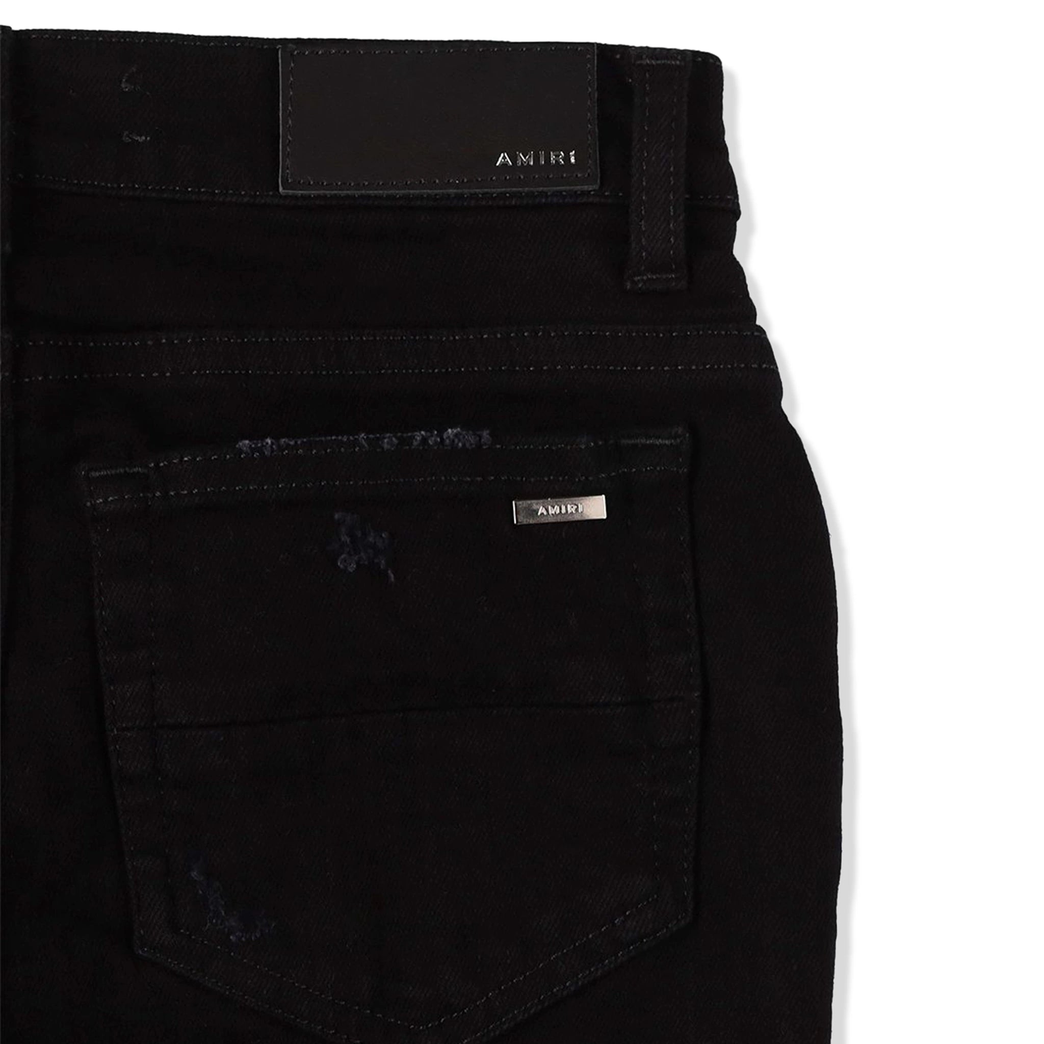 Back pocket view of Amiri Kids Stack Black Jeans PF22KDS004-018