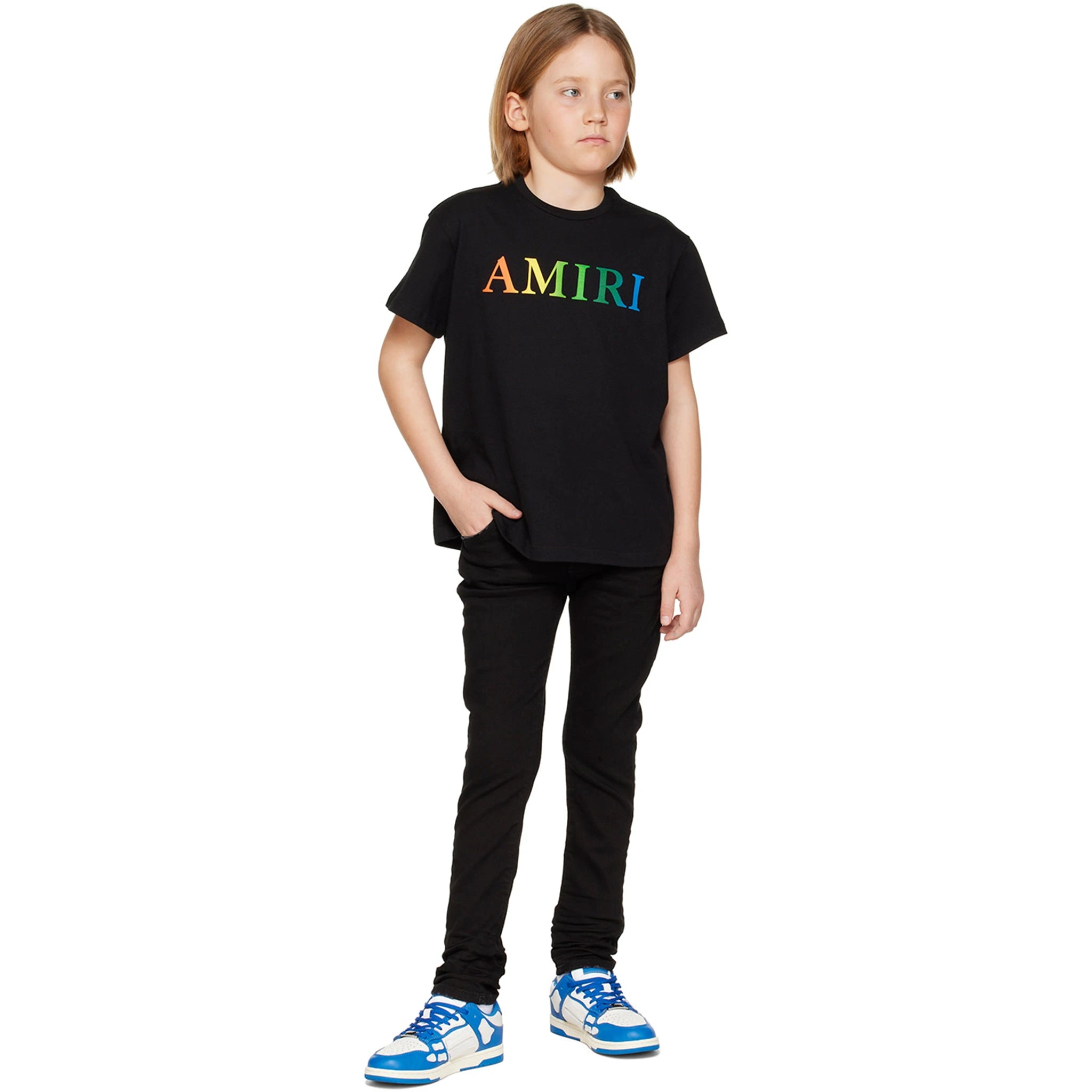 Model full view of Amiri Kids Stack Black Jeans PF22KDS004-018