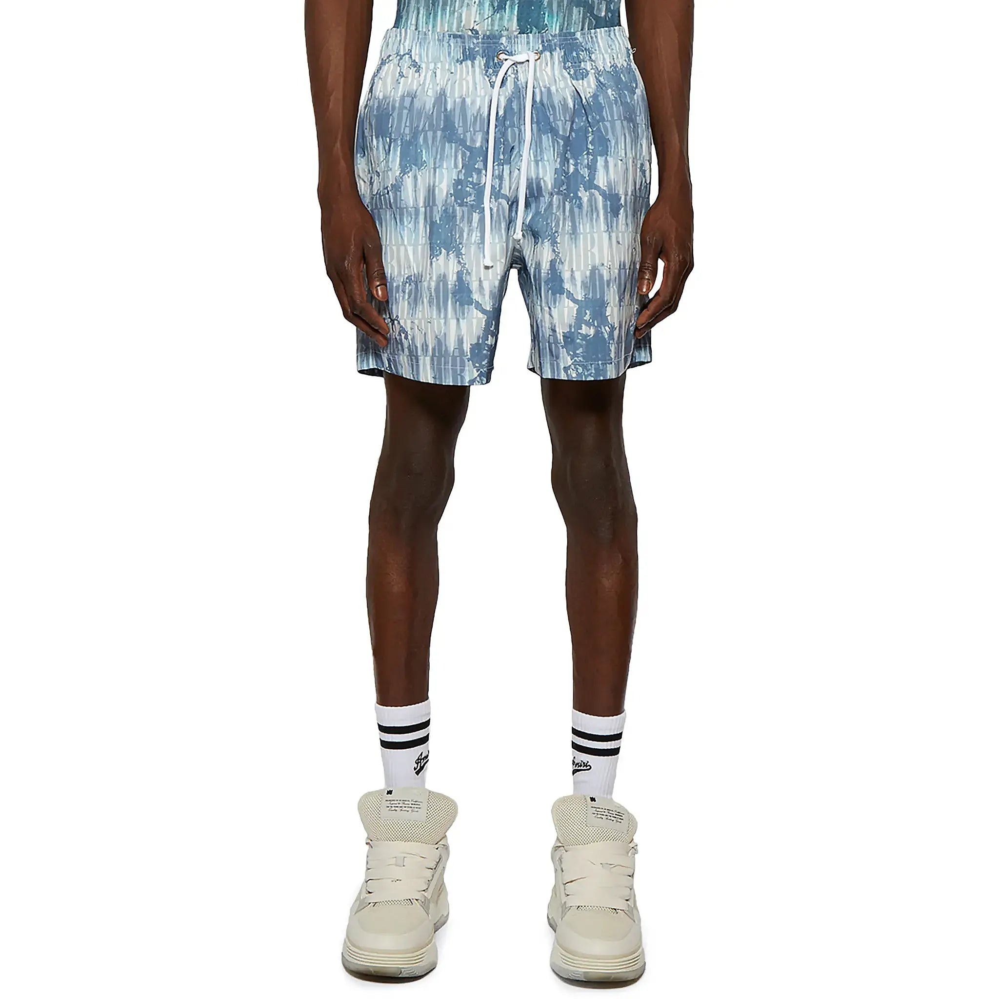 Model front view of Amiri Tie Dye Blue Swim Shorts SS23MSB002-420