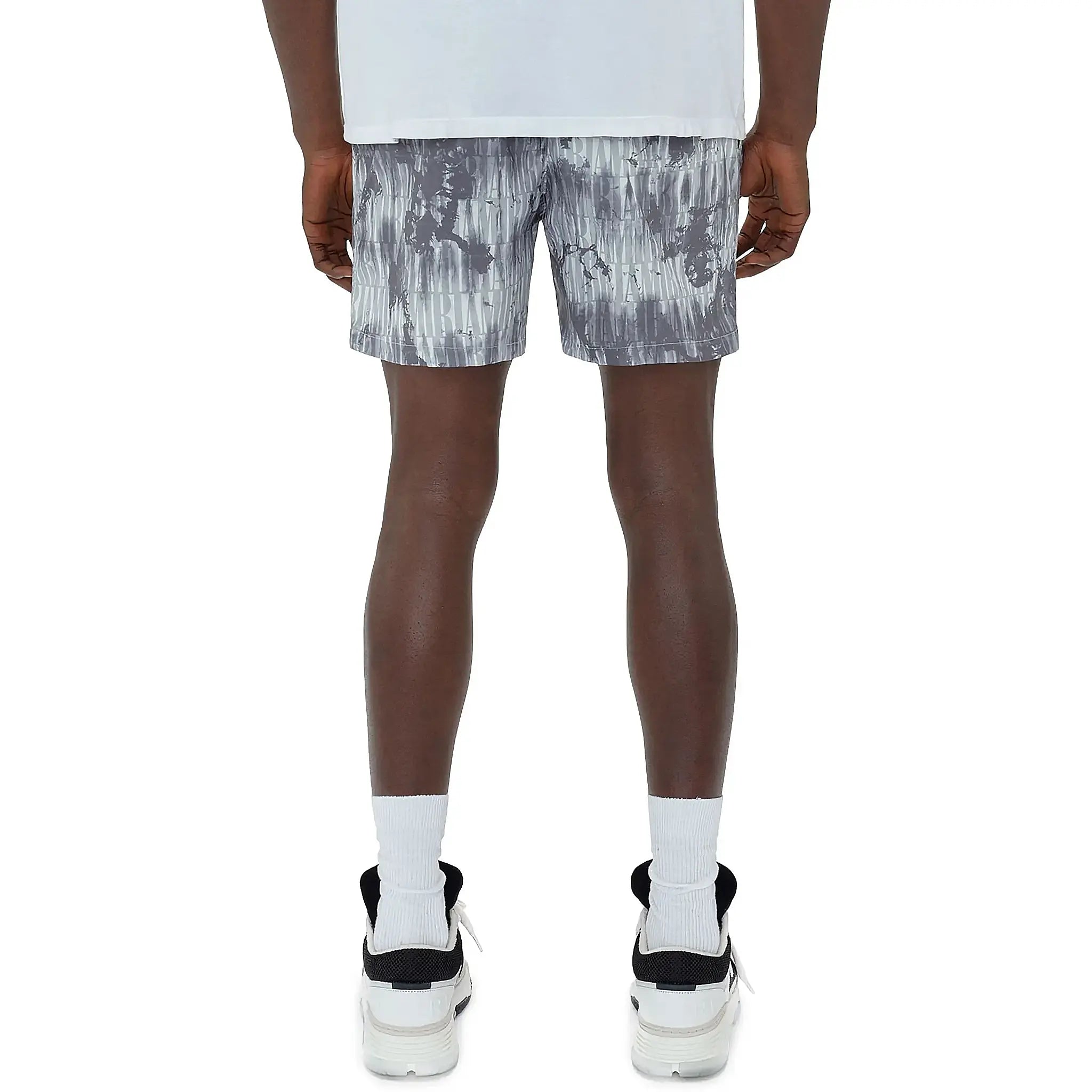 Model back view of Amiri Tie Dye Grey Swim Shorts SS23MSB002-030