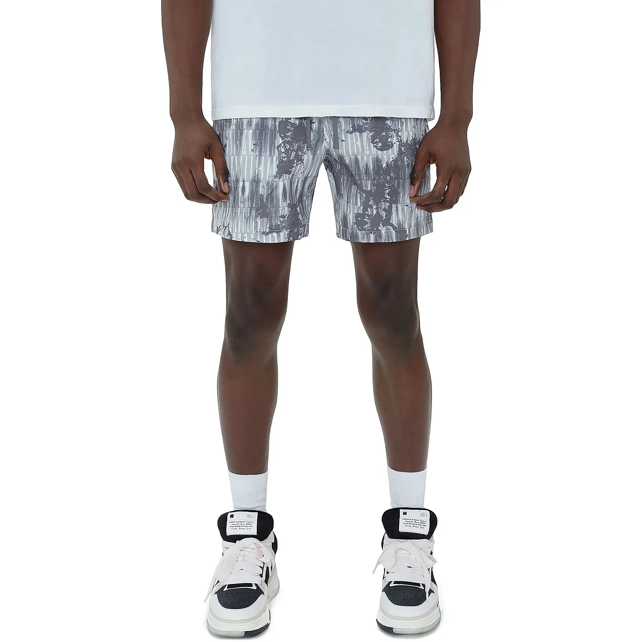 Model front view of Amiri Tie Dye Grey Swim Shorts SS23MSB002-030