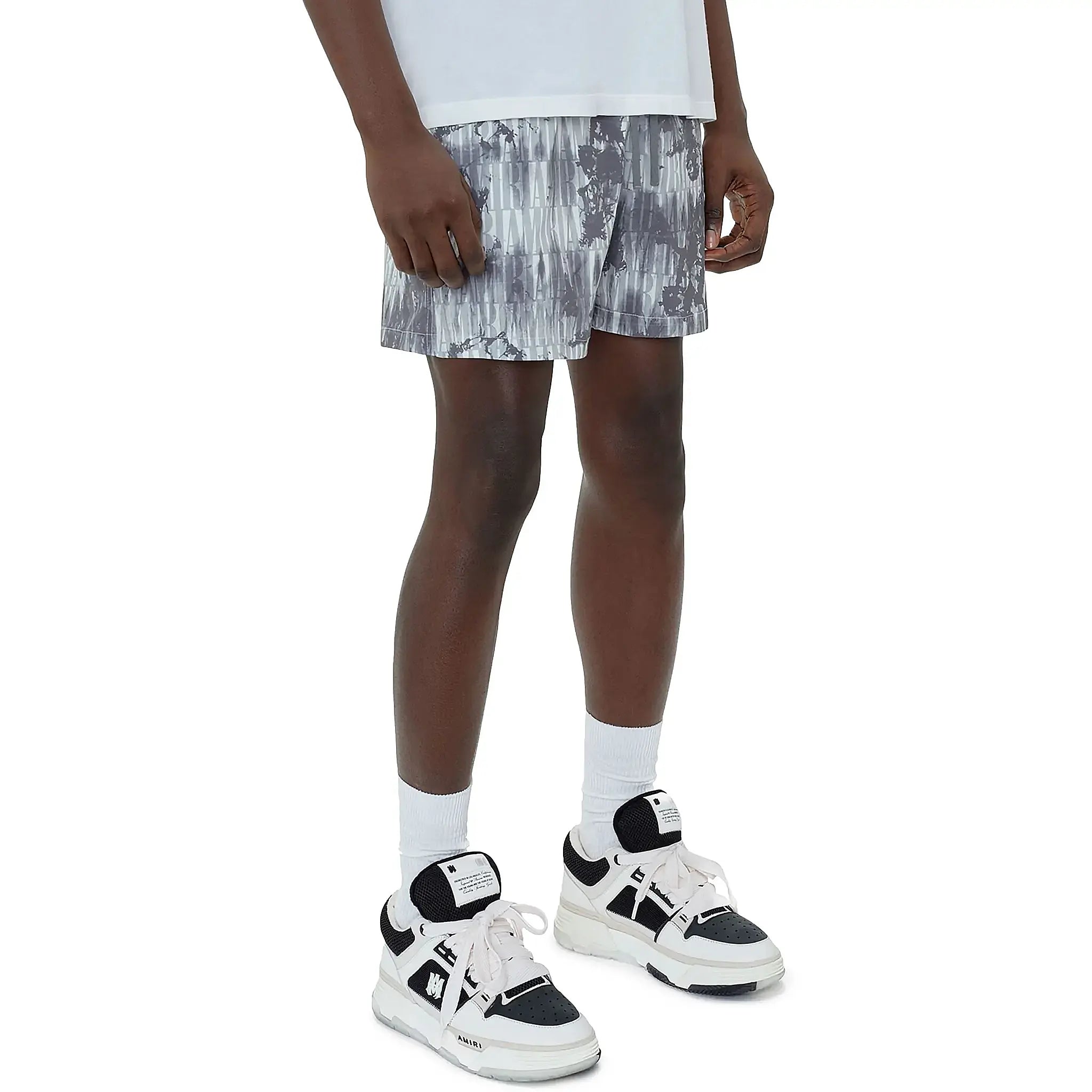 Model side view of Amiri Tie Dye Grey Swim Shorts SS23MSB002-030