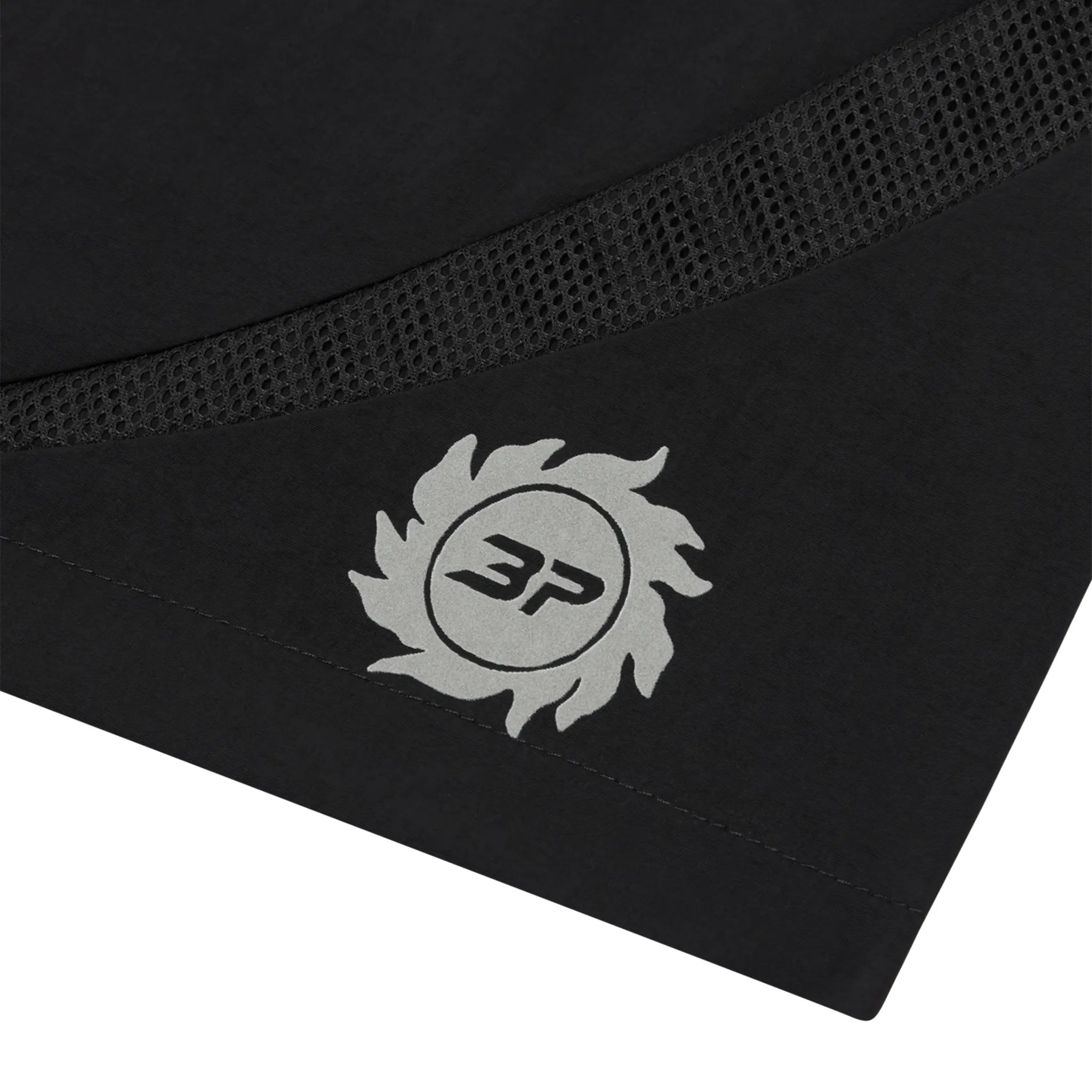 Logo patch view of Broken Planet Black Swimming Shorts