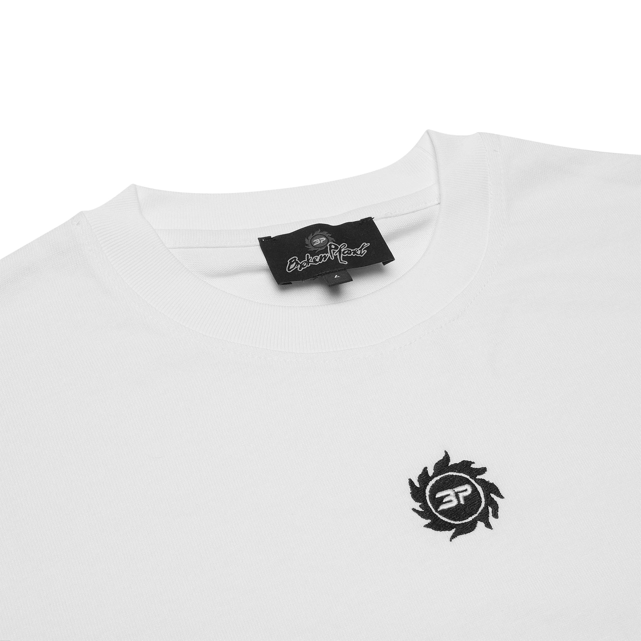 Logo view of Broken Planet Cropped White T Shirt