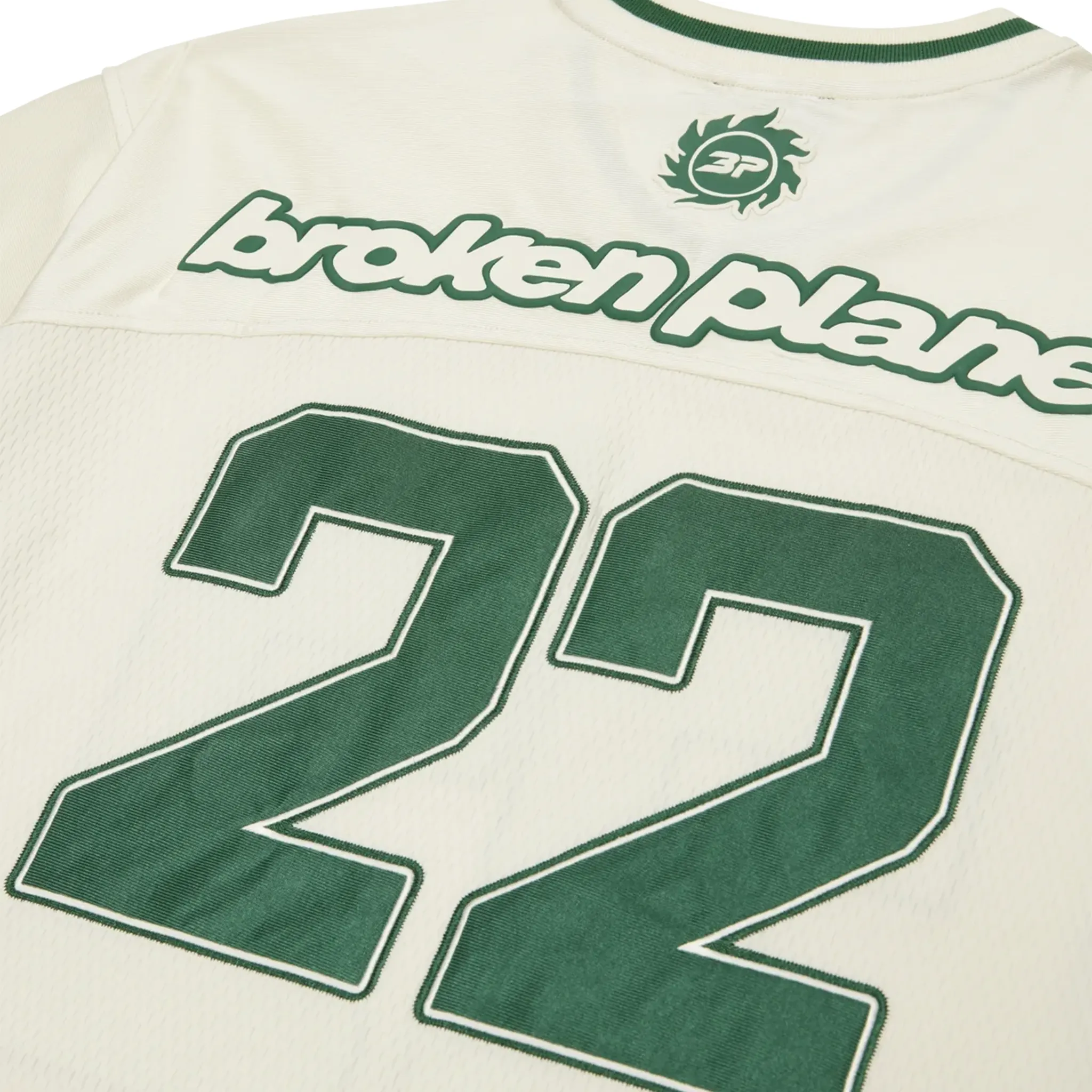 Back detail view of Broken Planet Football Green Cream Jersey