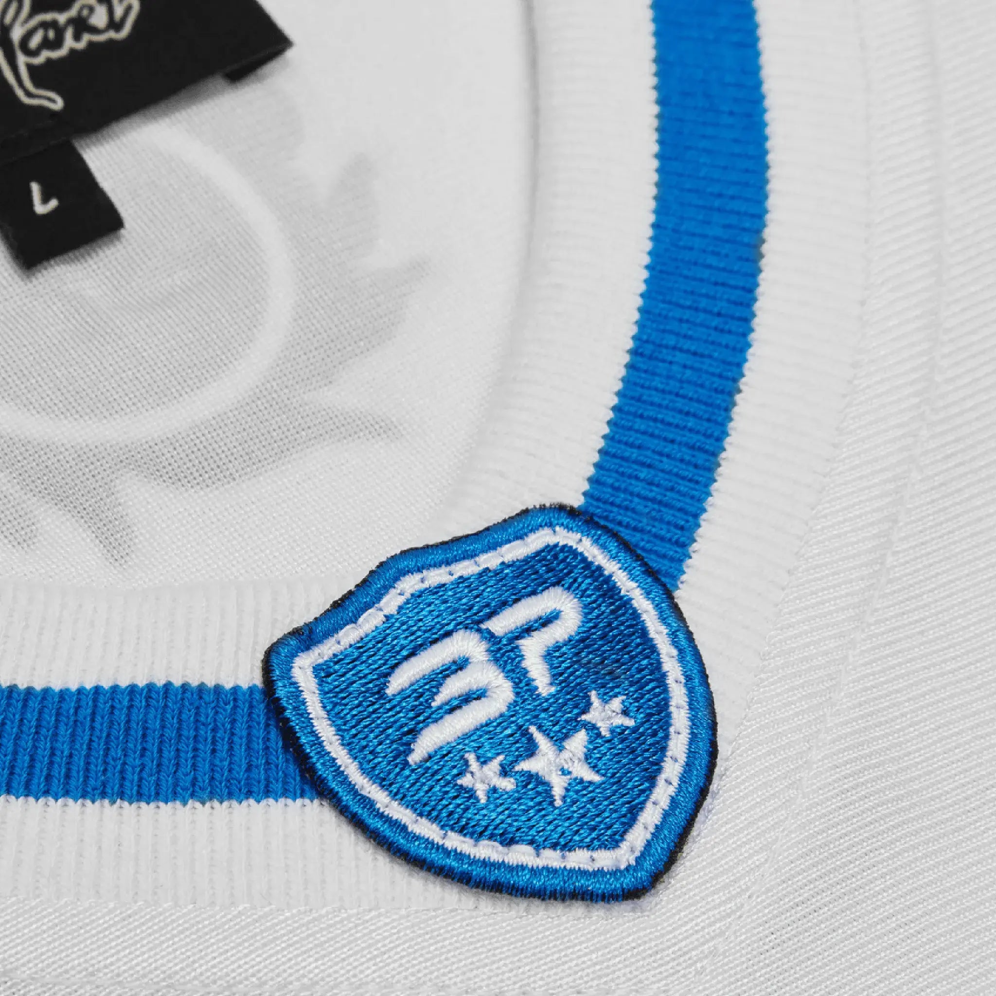 Neck detail view of Broken Planet White Blue Football Jersey BP-FT-JS-WHITE/BLUE