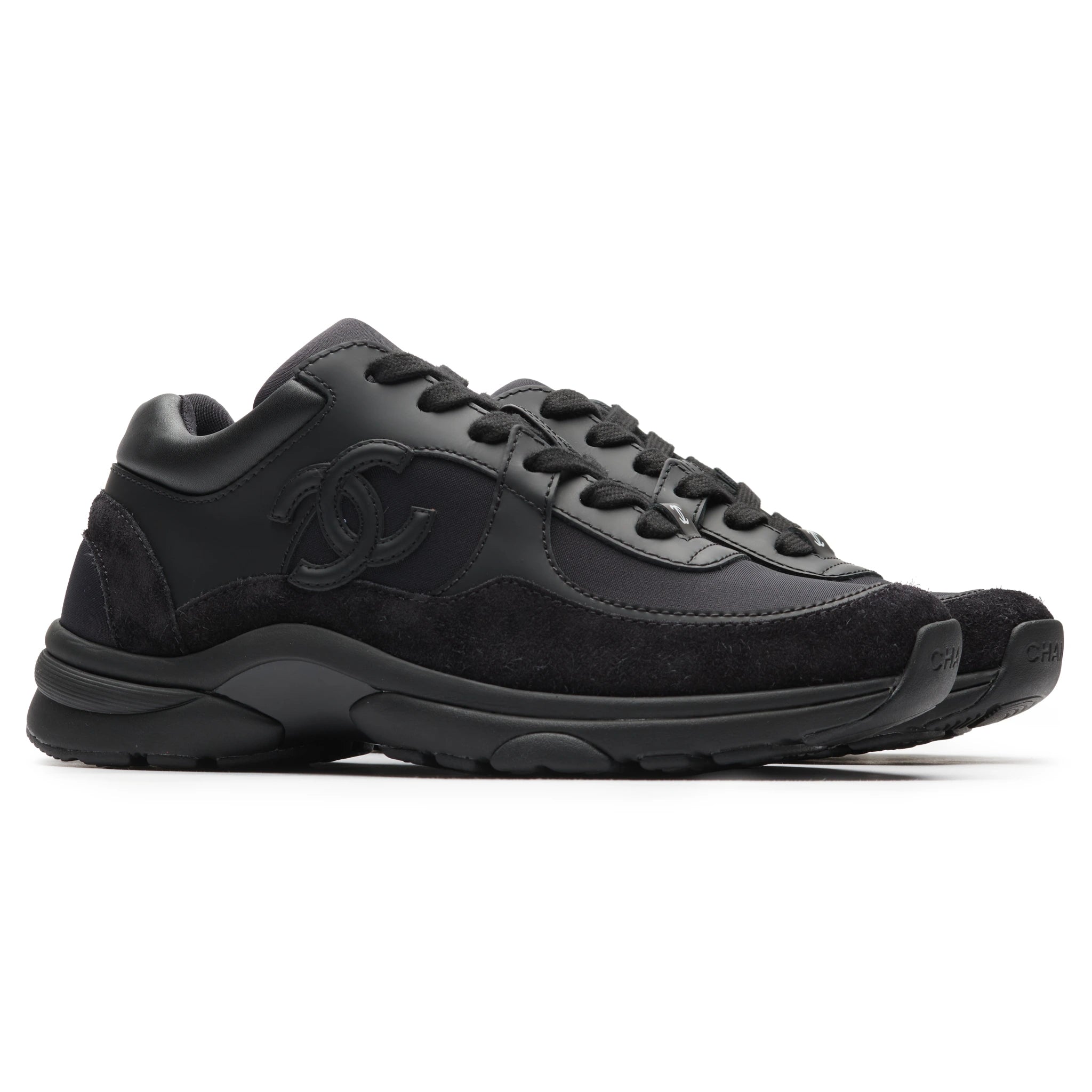 Front side view of Chanel CC Logo Suede Triple Black Sneaker