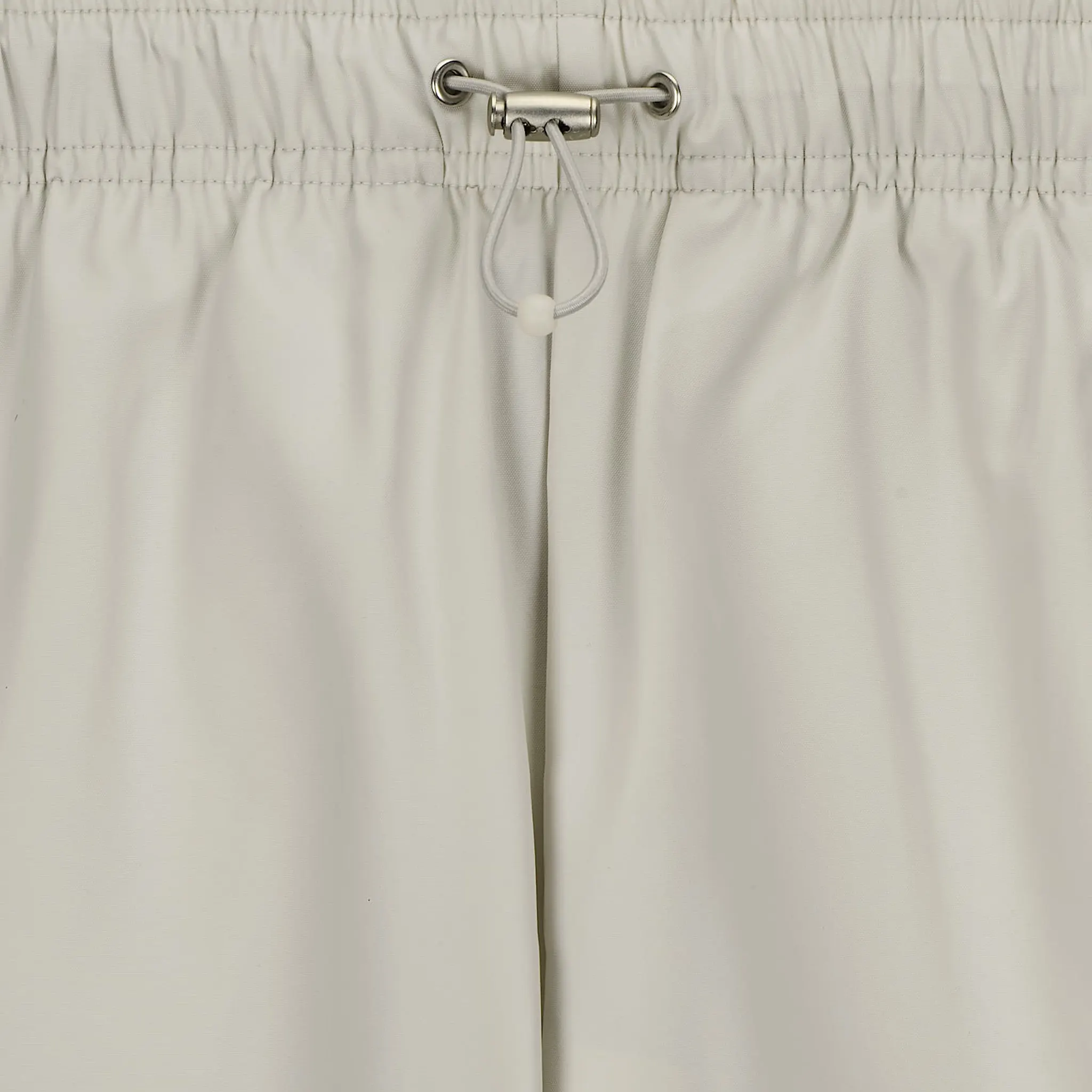 Waist view of Corteiz x Nike Light Bone Track Pants FV9347-072 