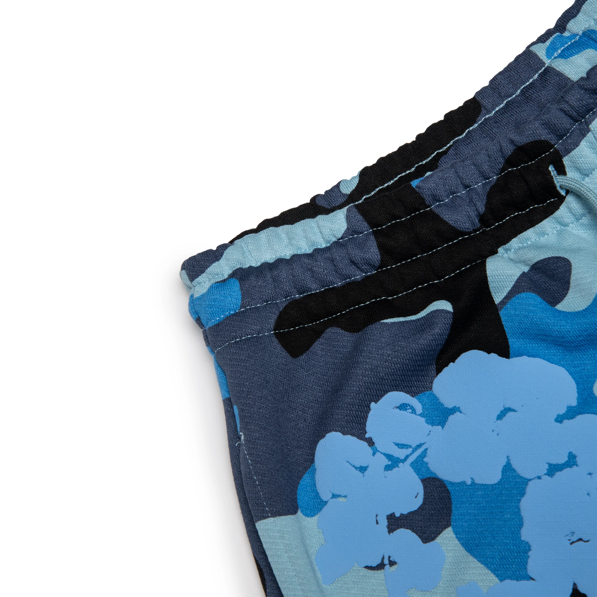 Corner view of Denim Tears Blue Camo Cotton Wreath Sweatpants