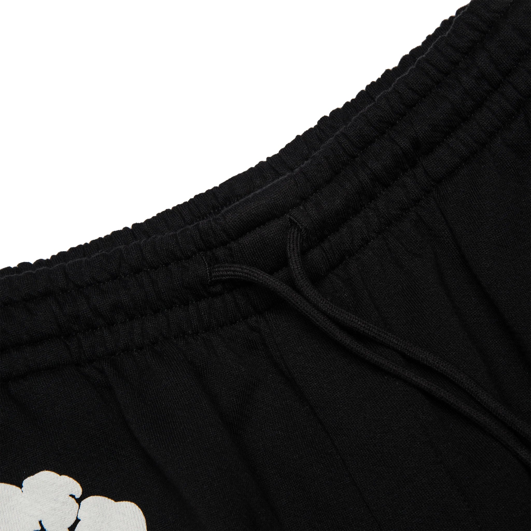Waist view of Denim Tears The Cotton Wreath Black Shorts 