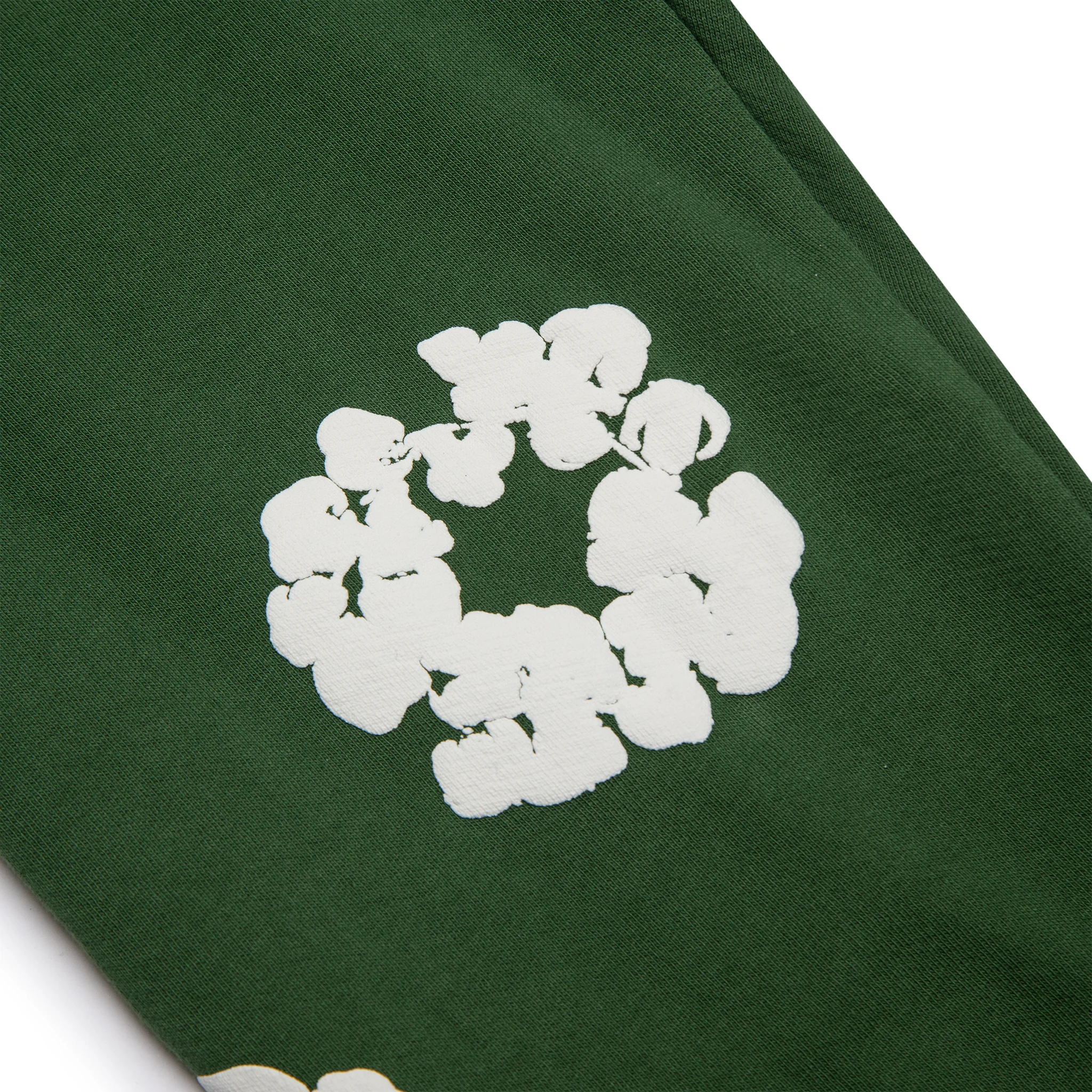 Patch view of Denim Tears The Cotton Wreath Green Sweatpants 