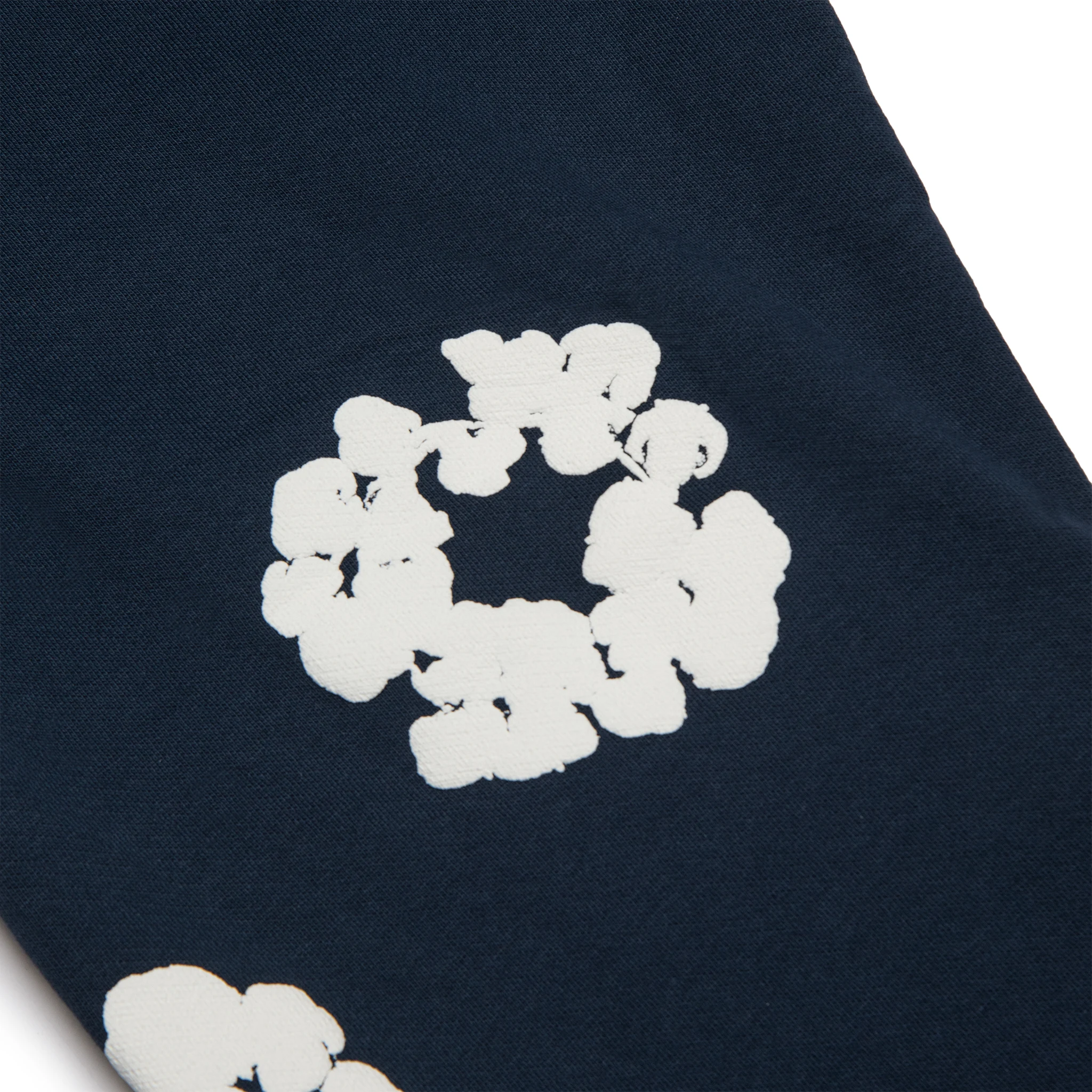 Patch view of Denim Tears The Cotton Wreath Navy Sweatpants 