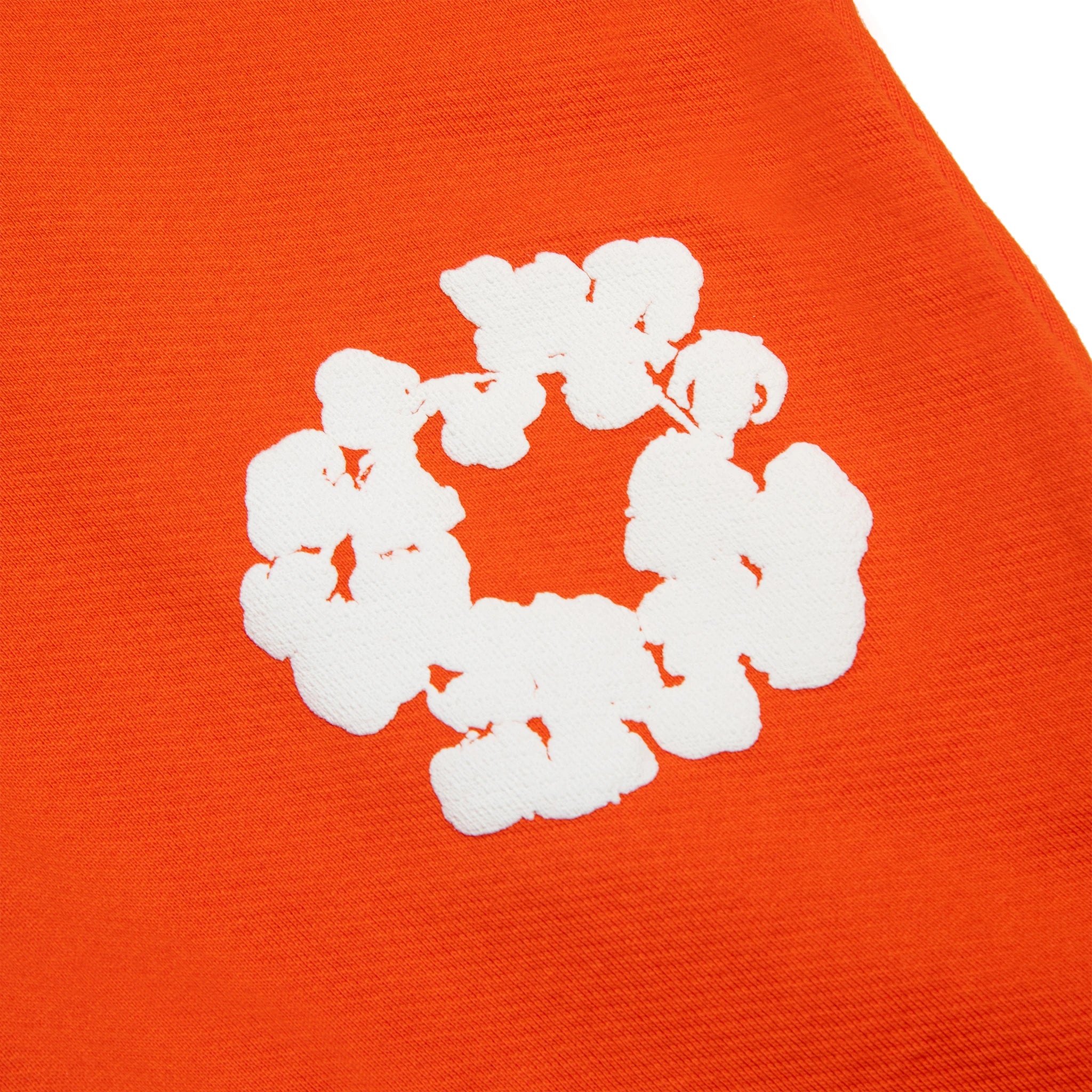 Patch view of Denim Tears The Cotton Wreath Orange Sweatpants 