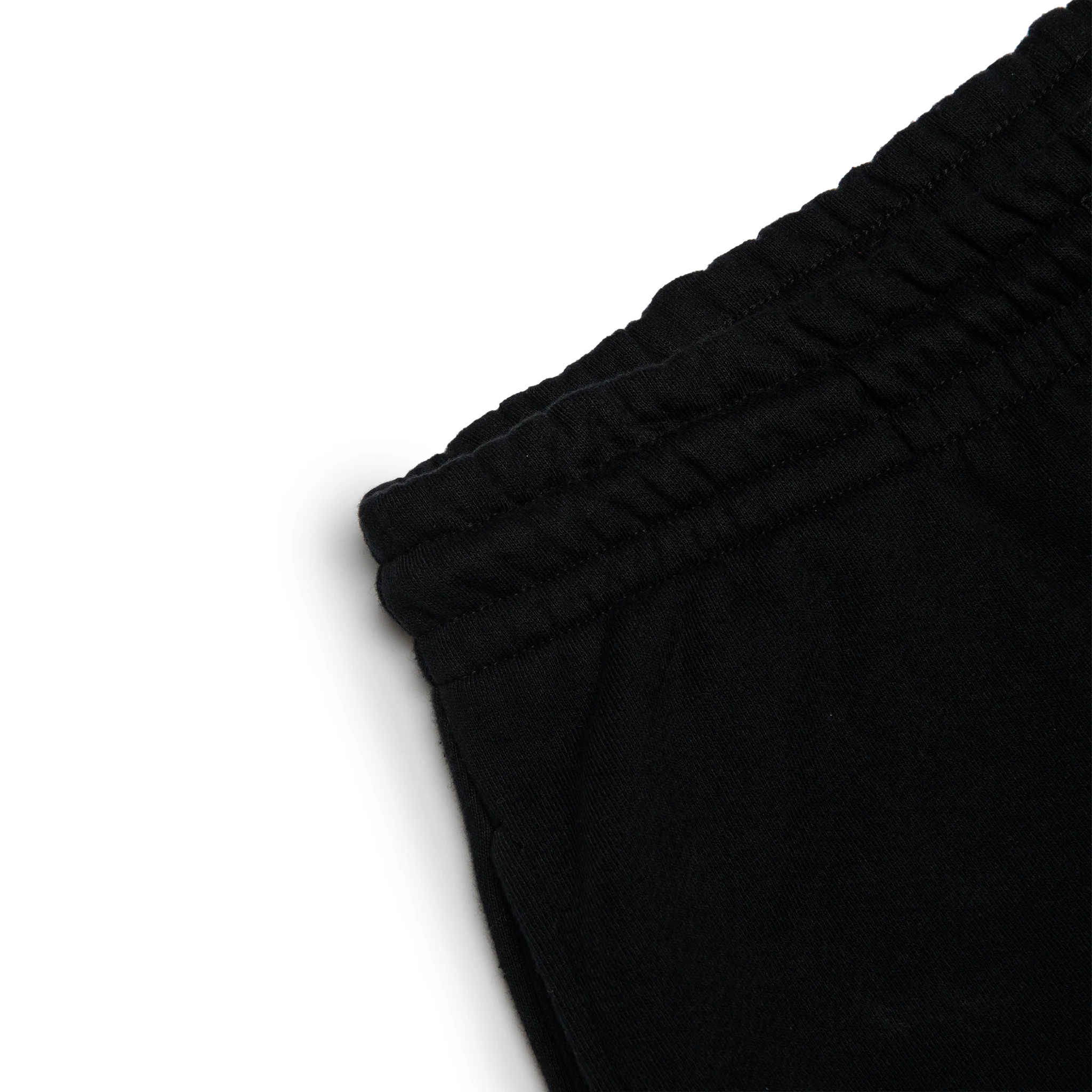 Corner detail view of Denim Tears University Black Sweatpants 