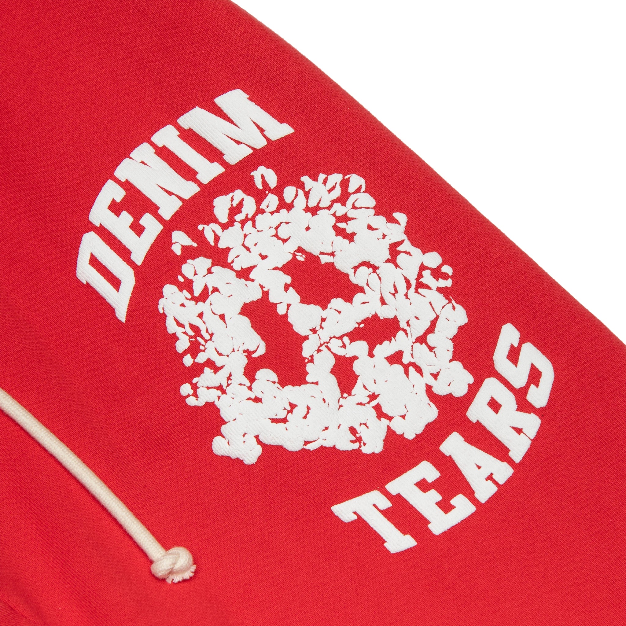 Logo patch view of Denim Tears University Red Sweatpants 