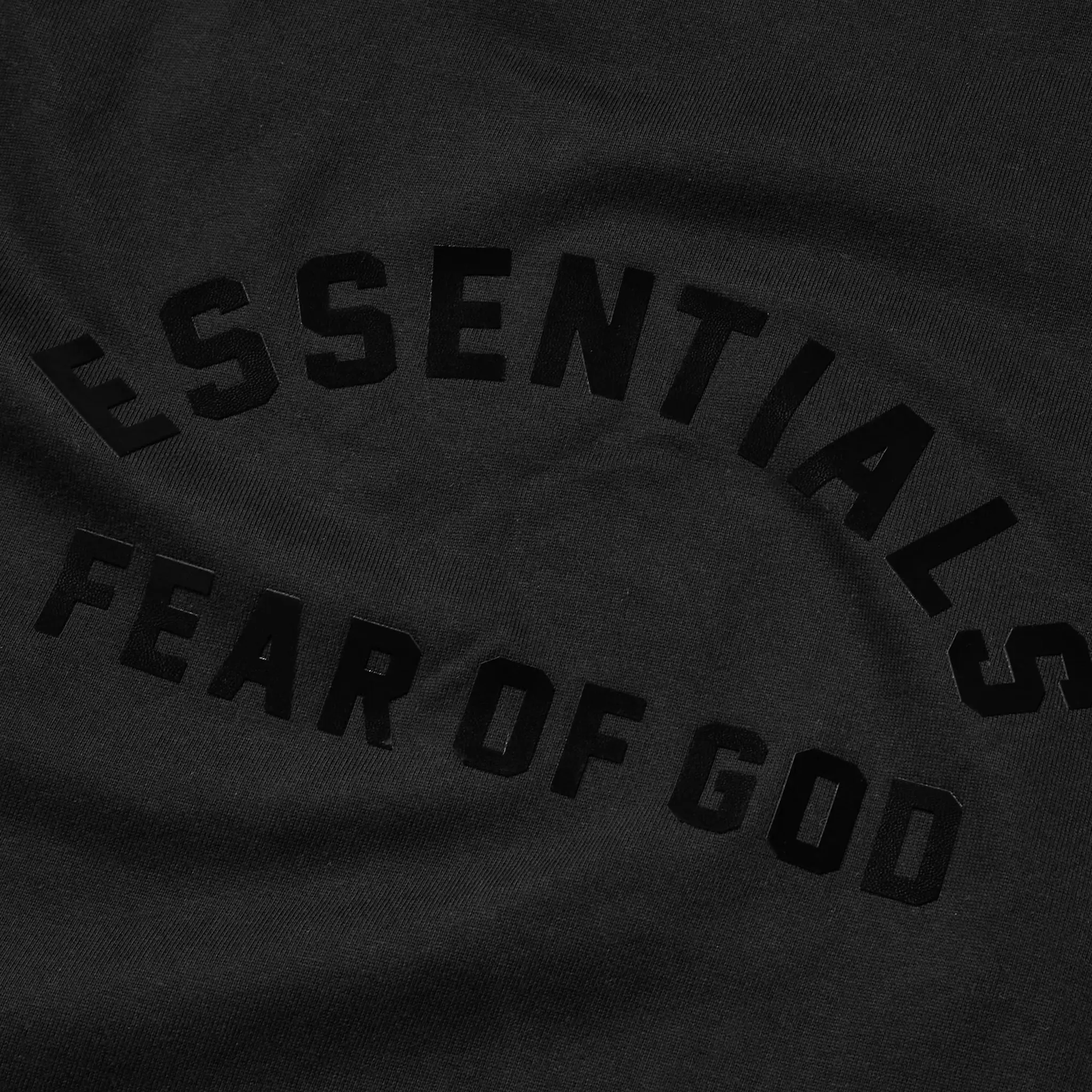 Detail view of Fear Of God Essentials Heavy Jersey Crewneck Jet Black T Shirt 125SP242004F