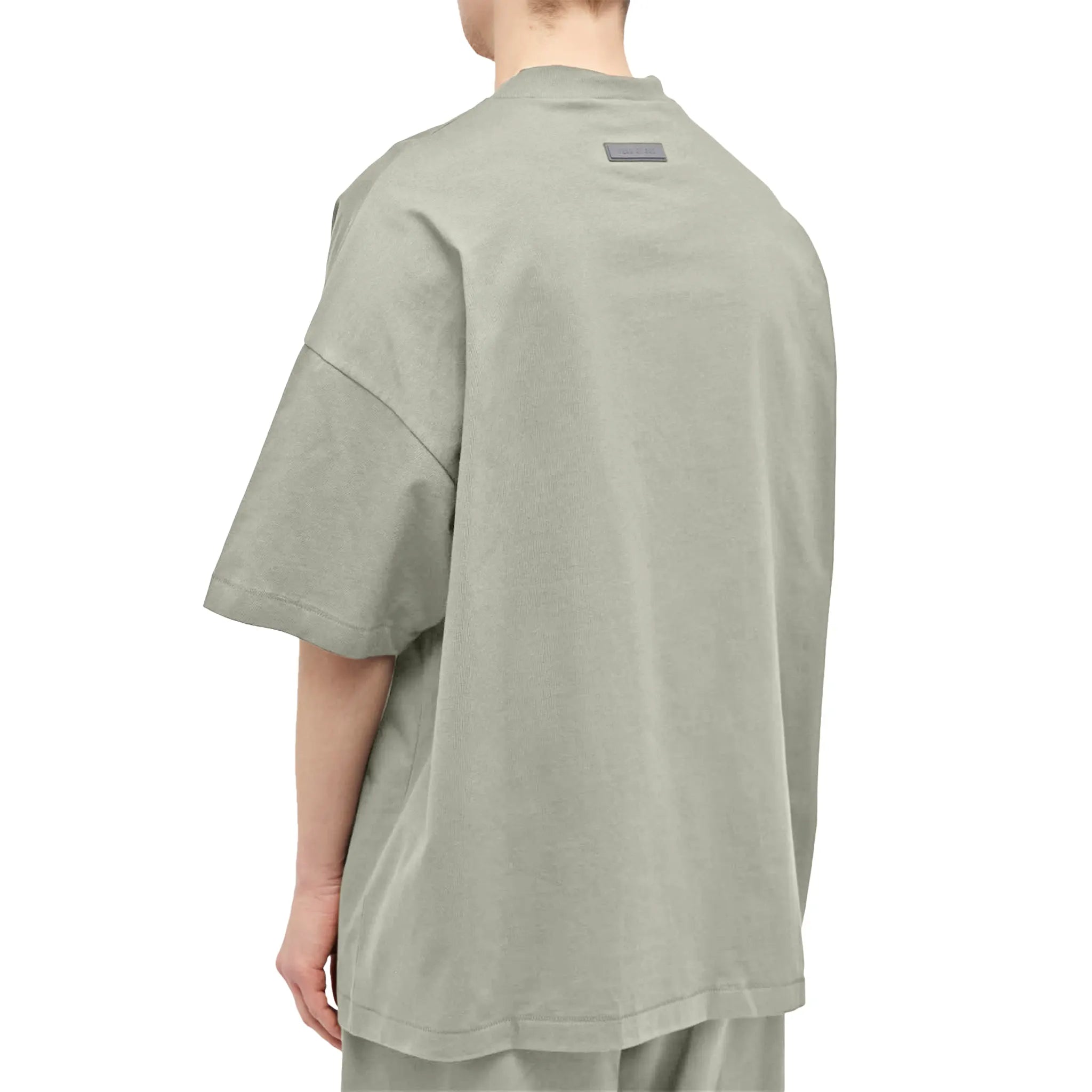 Model back view of Fear Of God Essentials S/S Seal Crewneck T Shirt