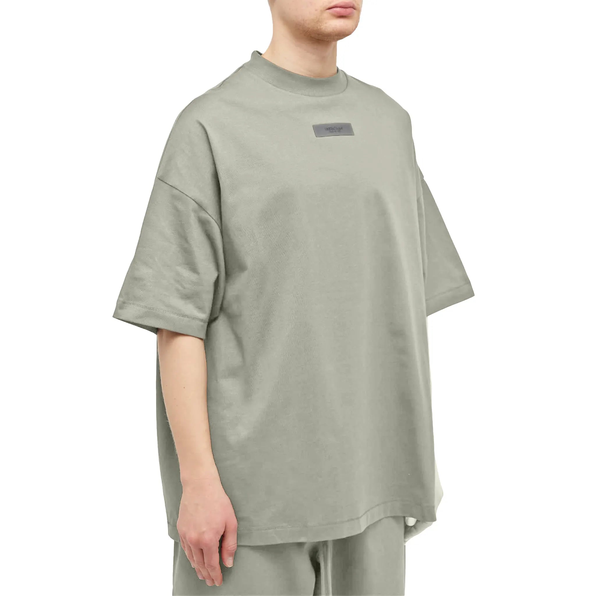 Model front side view of Fear Of God Essentials S/S Seal Crewneck T Shirt