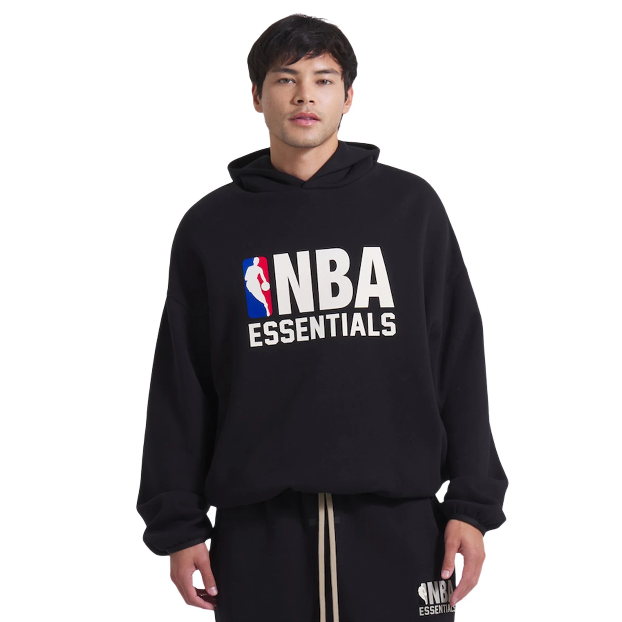 Model front view of Fear Of God Essentials x NBA Black Hoodie 192AL246401F