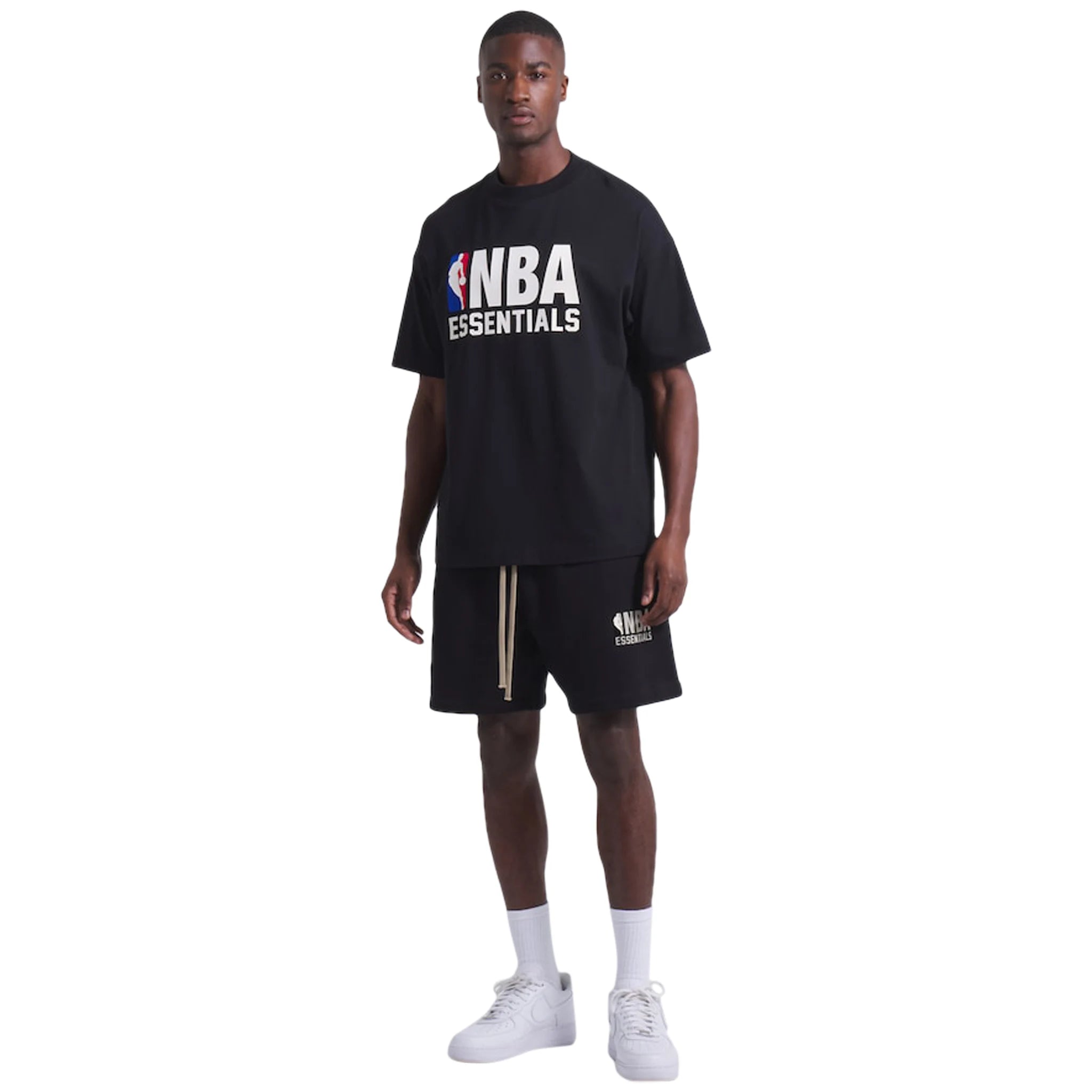 Model view of Fear Of God Essentials x NBA Black Shorts 160AL244001F