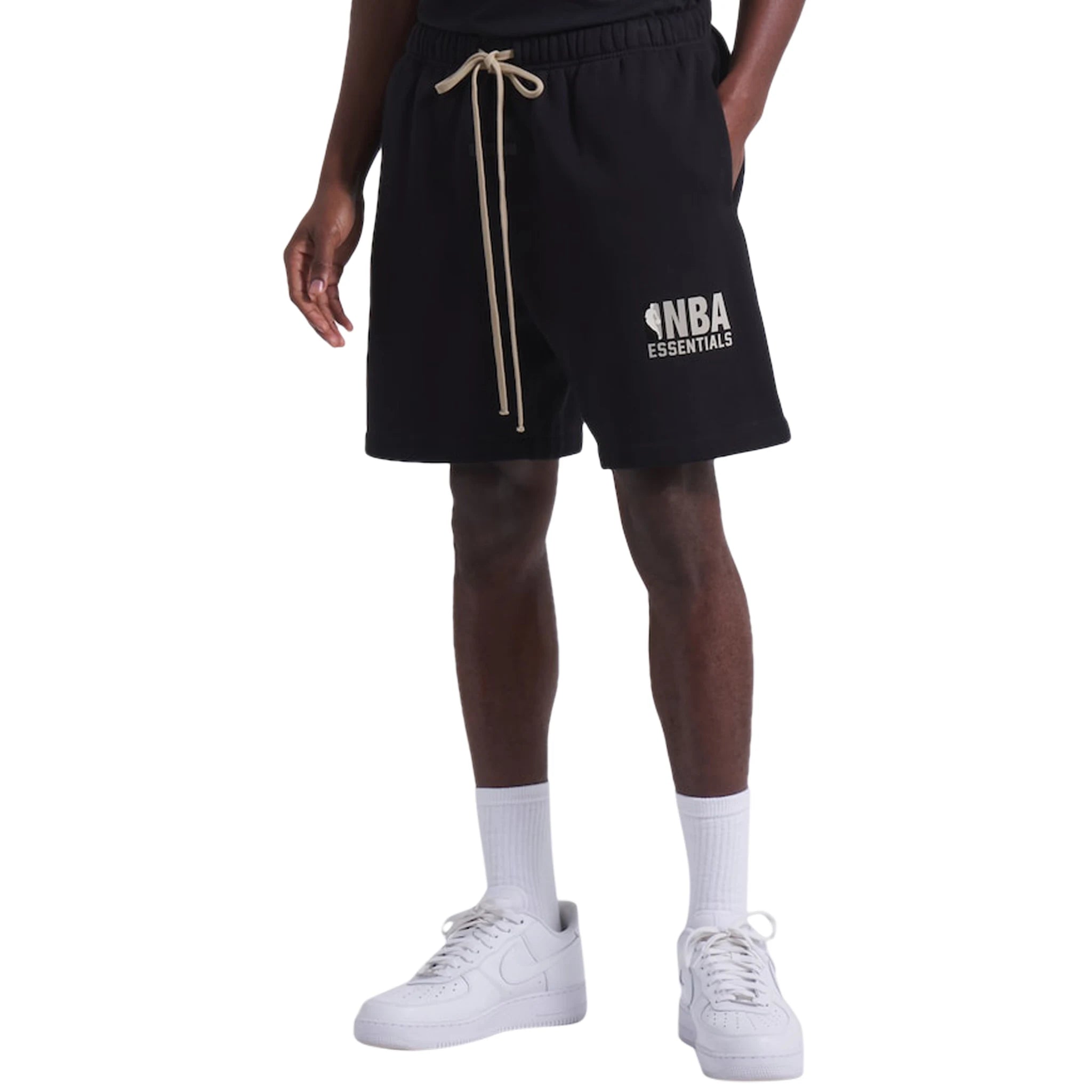 Model side view of Fear Of God Essentials x NBA Black Shorts 160AL244001F