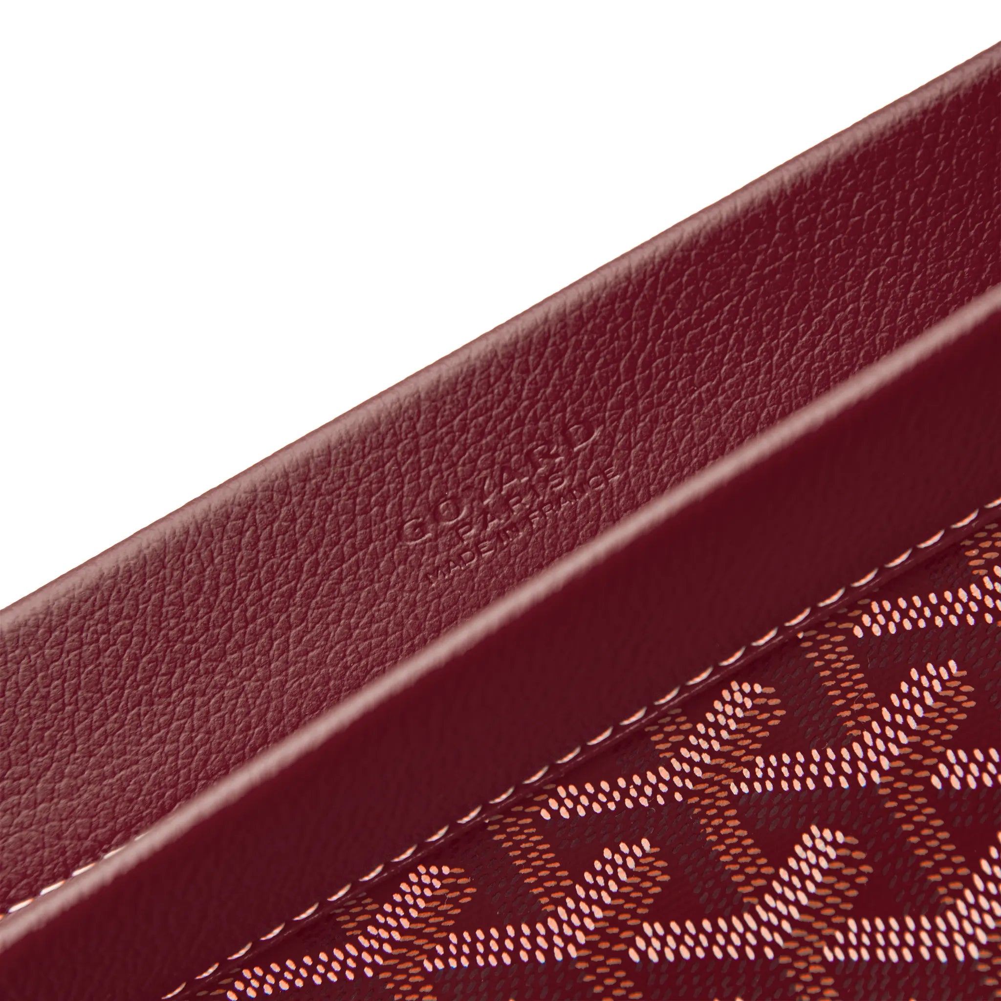 Logo detail view of Goyard Conti Burgundy Pouch