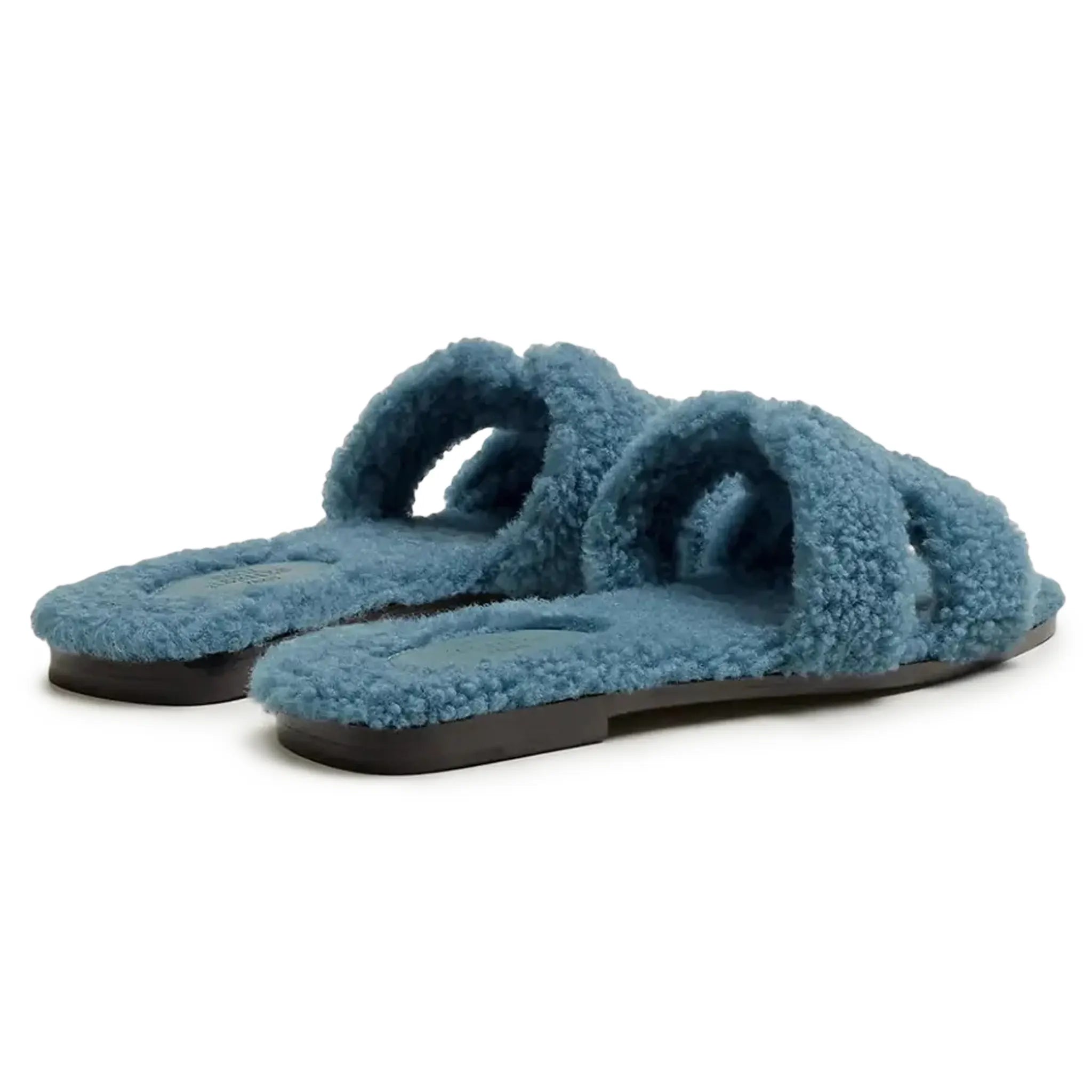 Side view of Hermes Paris Oran Blue Shearling Sandals