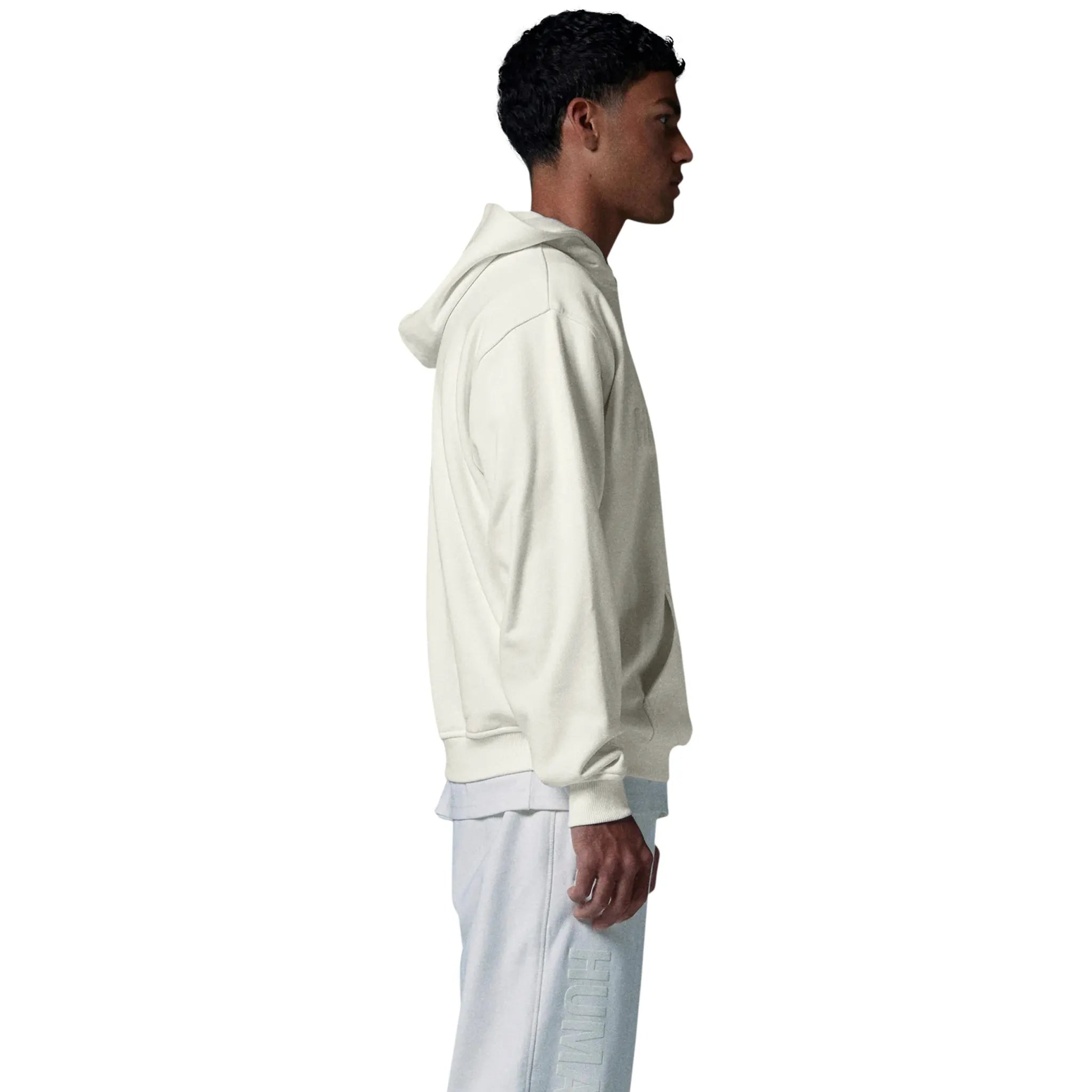 Model side view of Human Race Human Bone White Hoodie