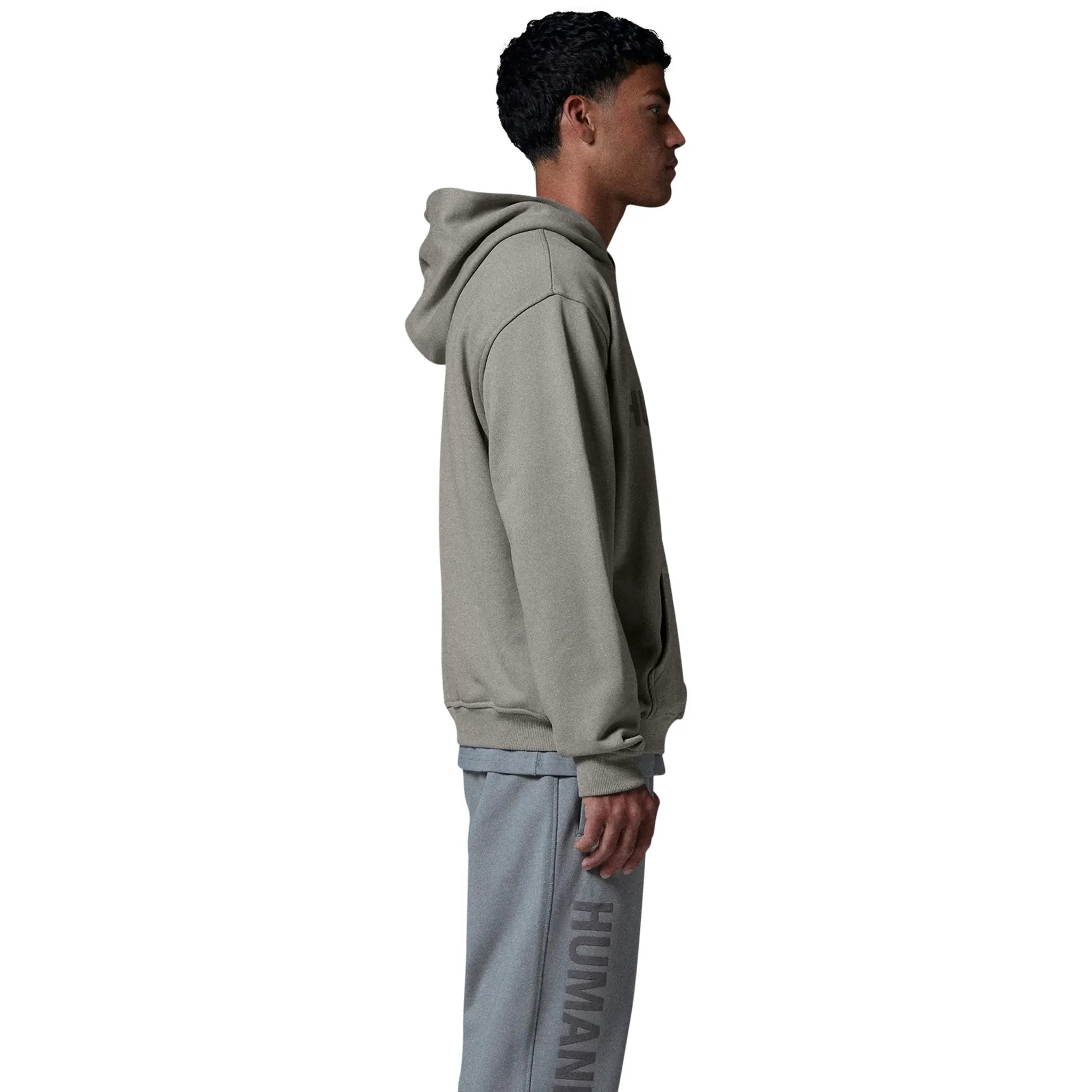 Model side view of Human Race Human Desert Grey Hoodie