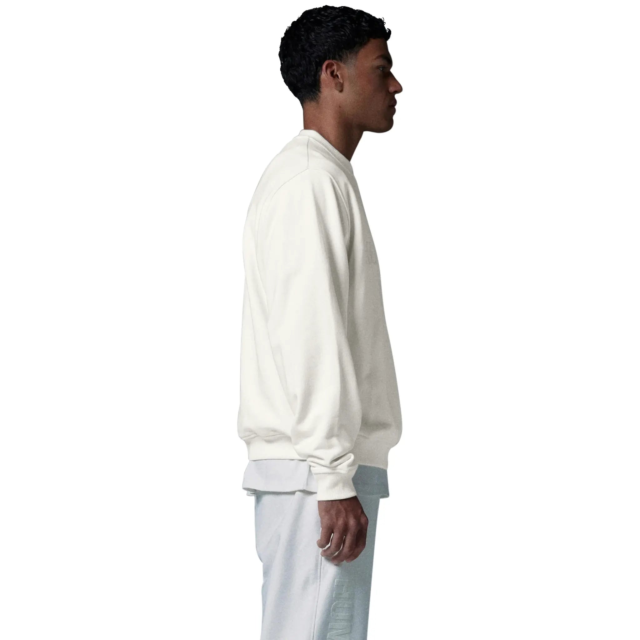 Model side view of Human Race Planet Bone White Sweatshirt 