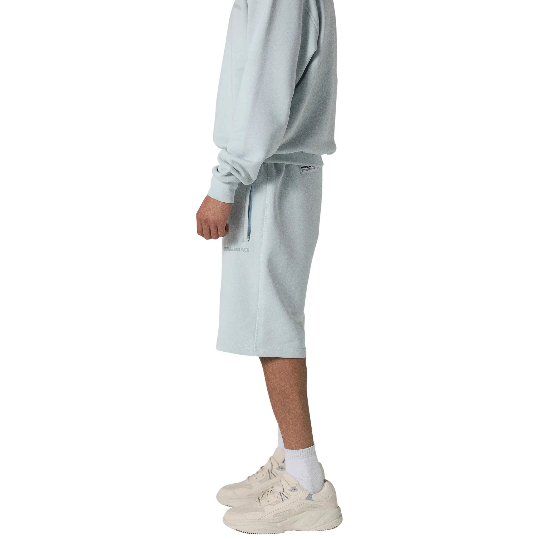 Model side view of Human Race Stars Soft Blue Shorts