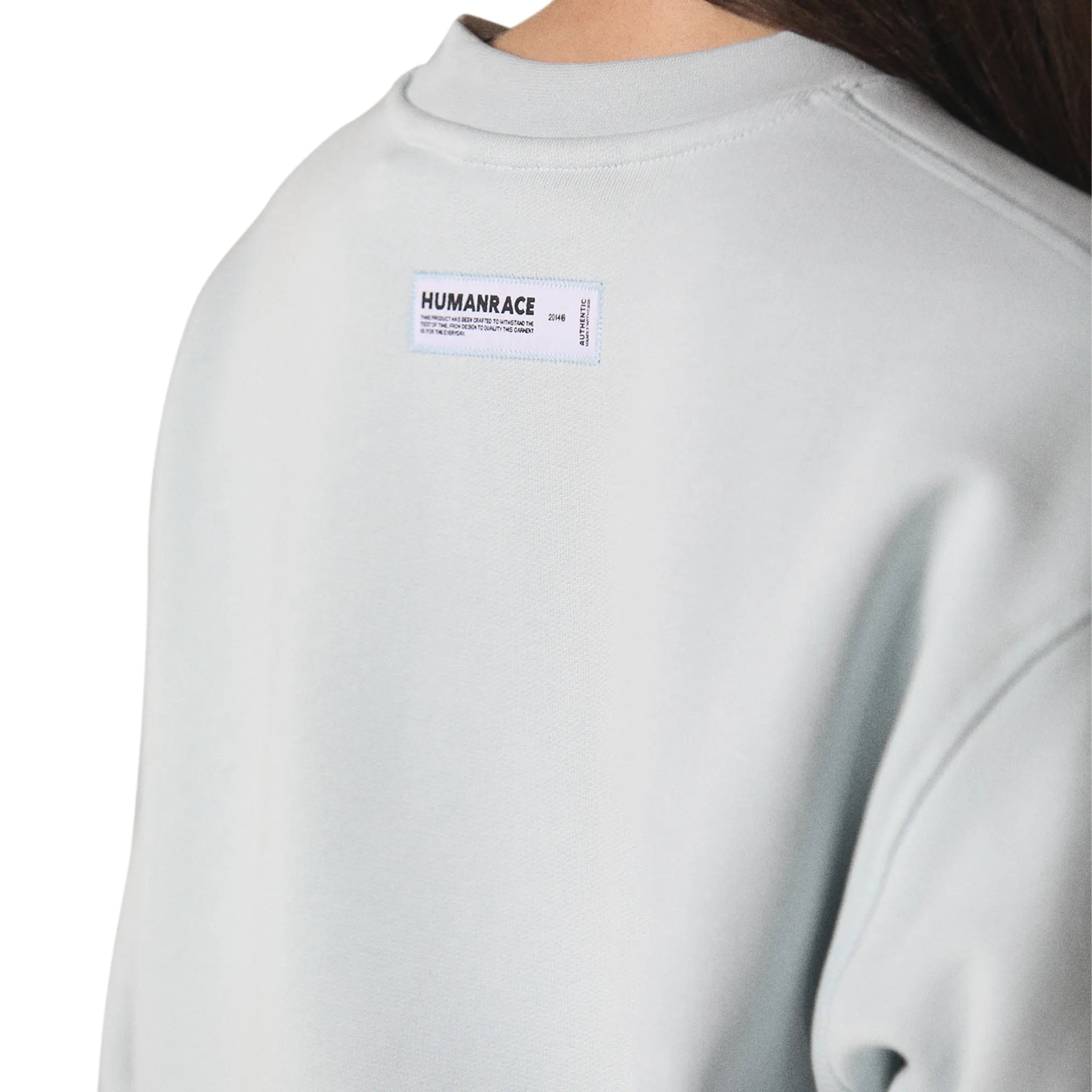 Model detail view of Human Race World Soft Blue Sweatshirt