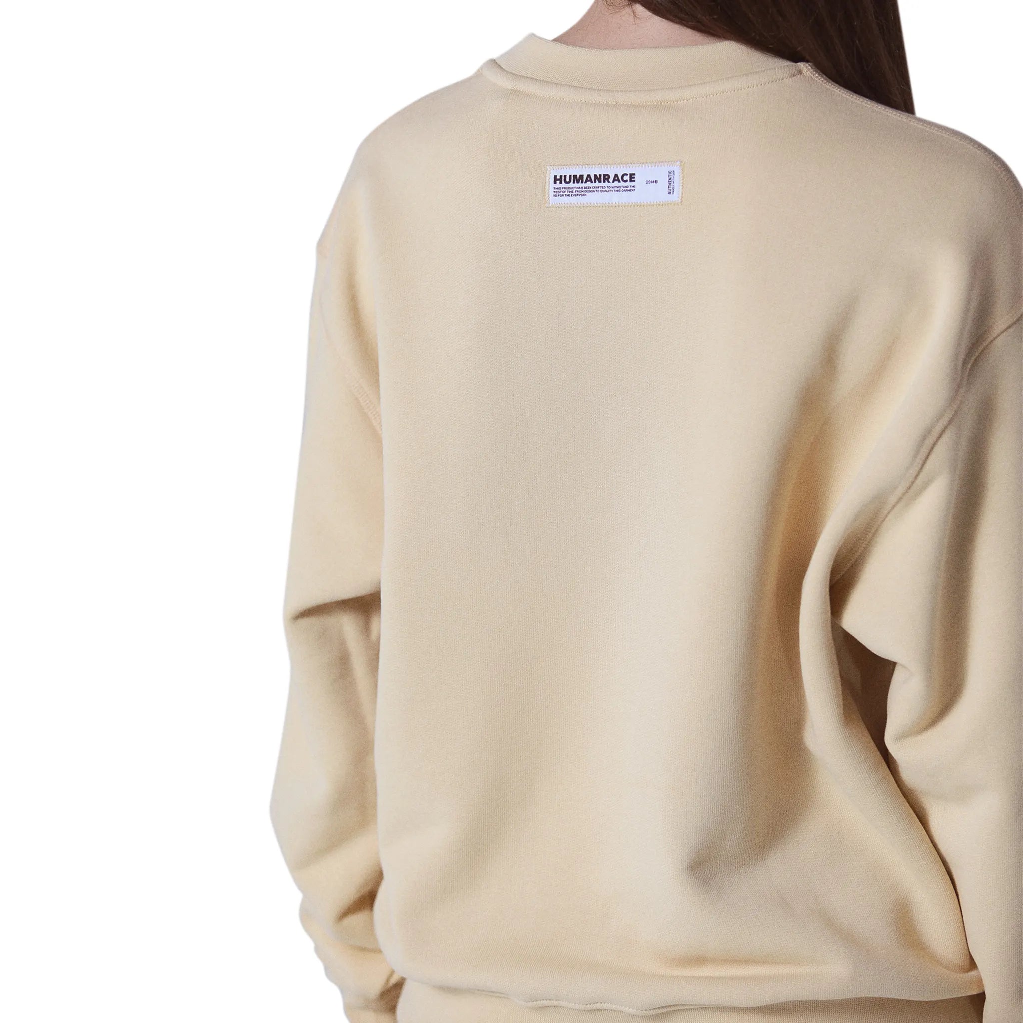 Model back detail view of Human Race World Vintage Yellow Sweatshirt