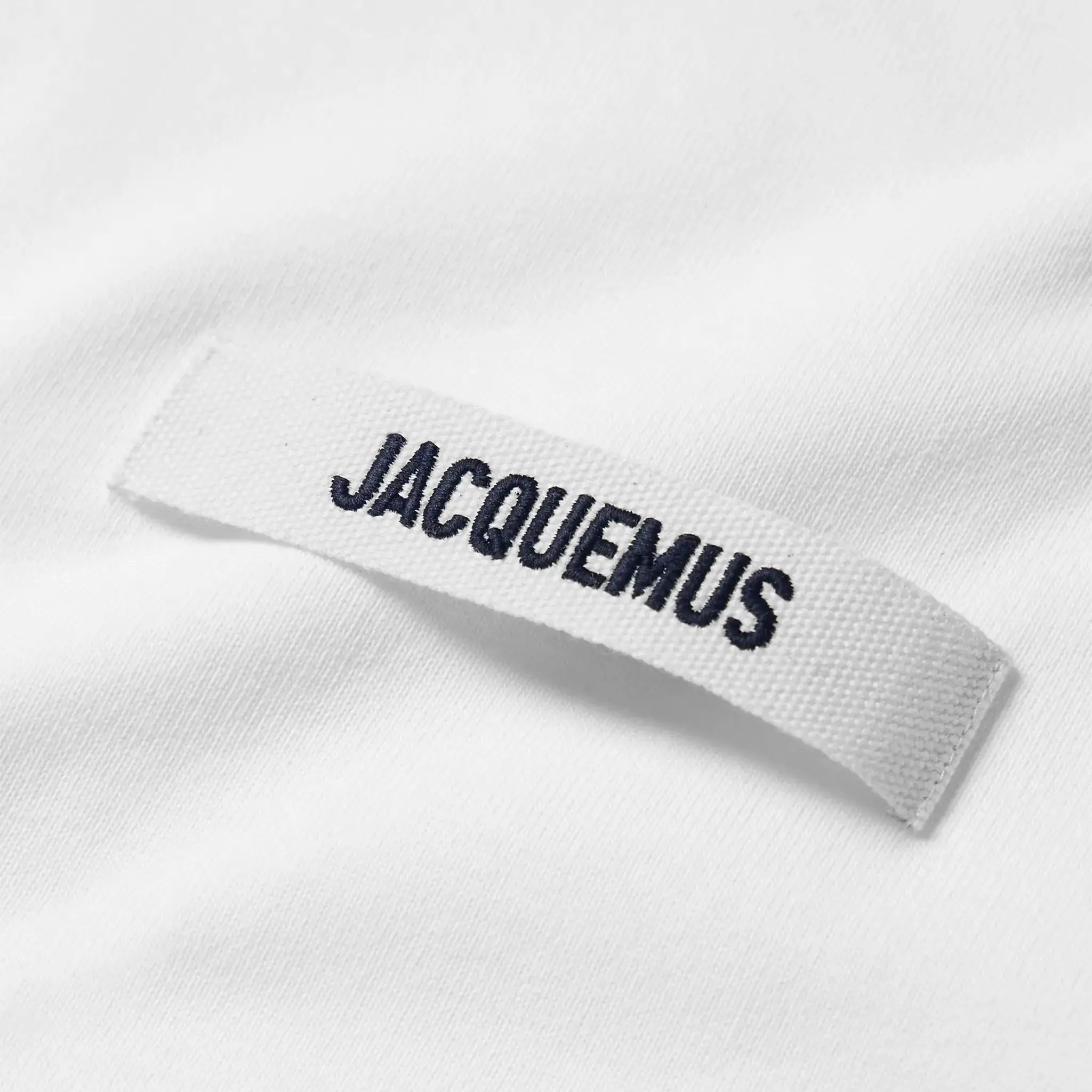 Logo view of Jacquemus Grosgrain Brand Logo Tab White T Shirt 245JS208-2125-950