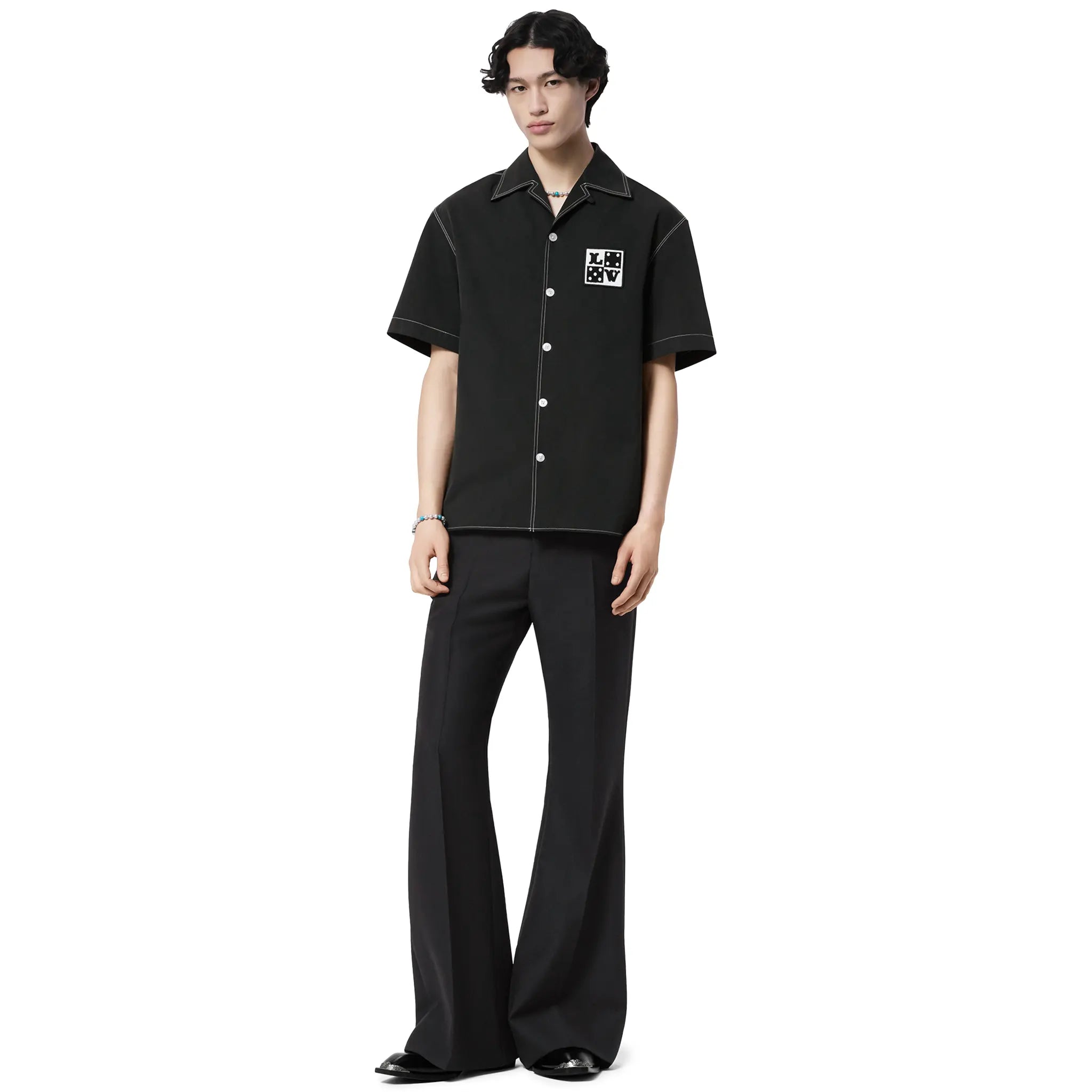 Model front view of Louis Vuitton Dice Patch Embroidered Short-Sleeved Black Cotton Shirt NVPROD5530131V