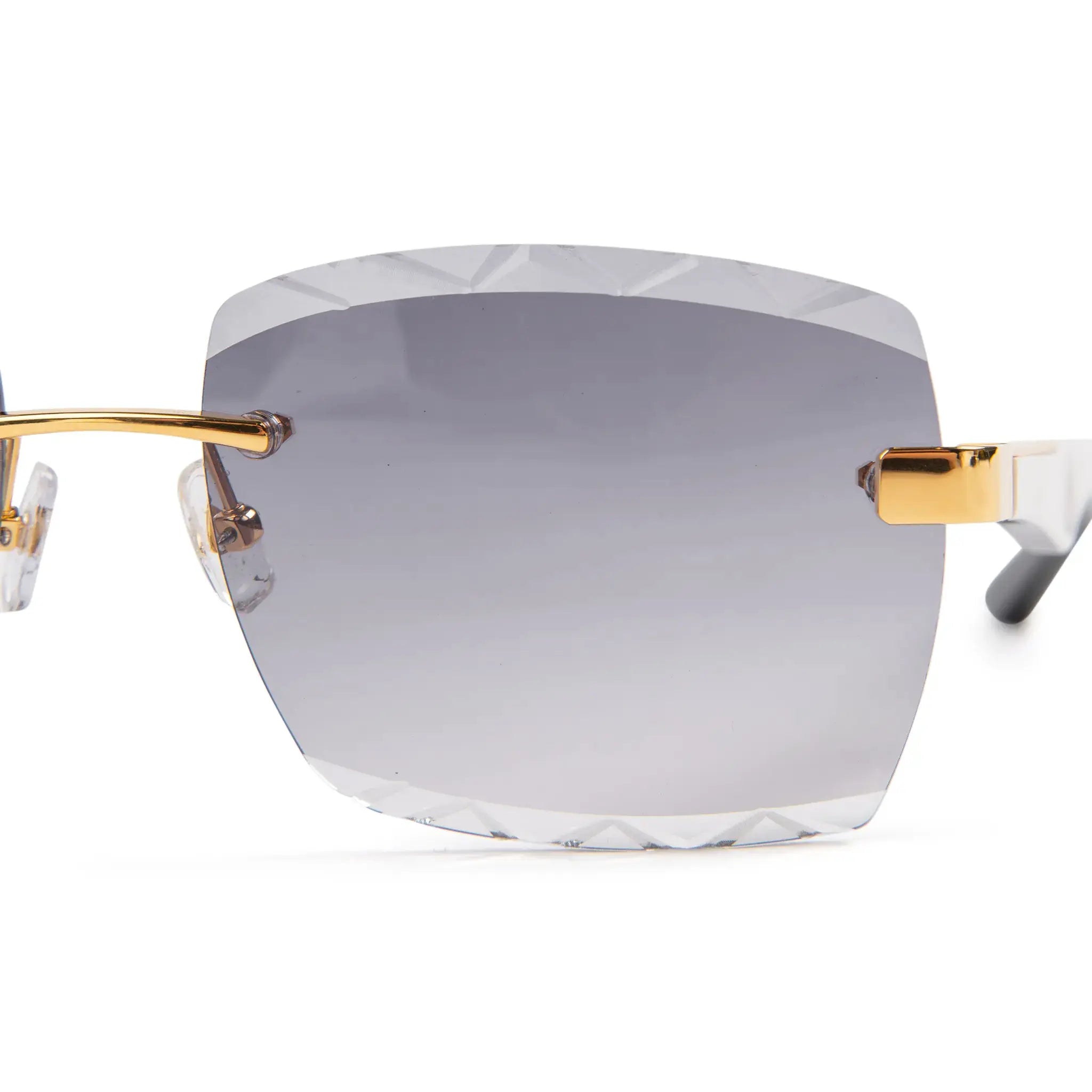 Lens view of Maybach Eyecompleted The Artist III G-HAS-ZZ5 Custom Gold Grey Fade Diamond Cut Sunglasses