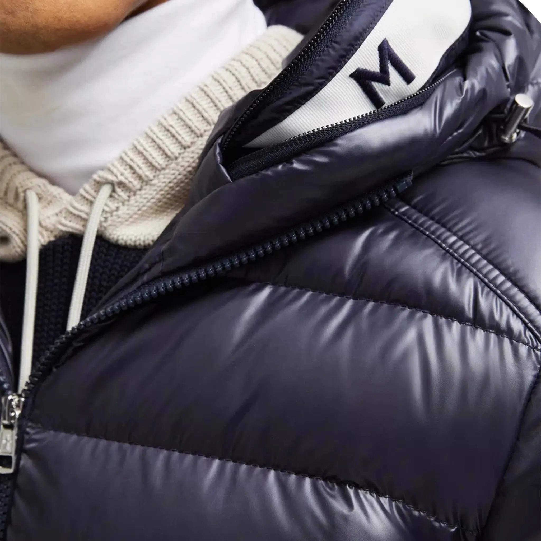 Model hood view of Moncler Besines Navy Short Down Jacket J20911A00003597EX779