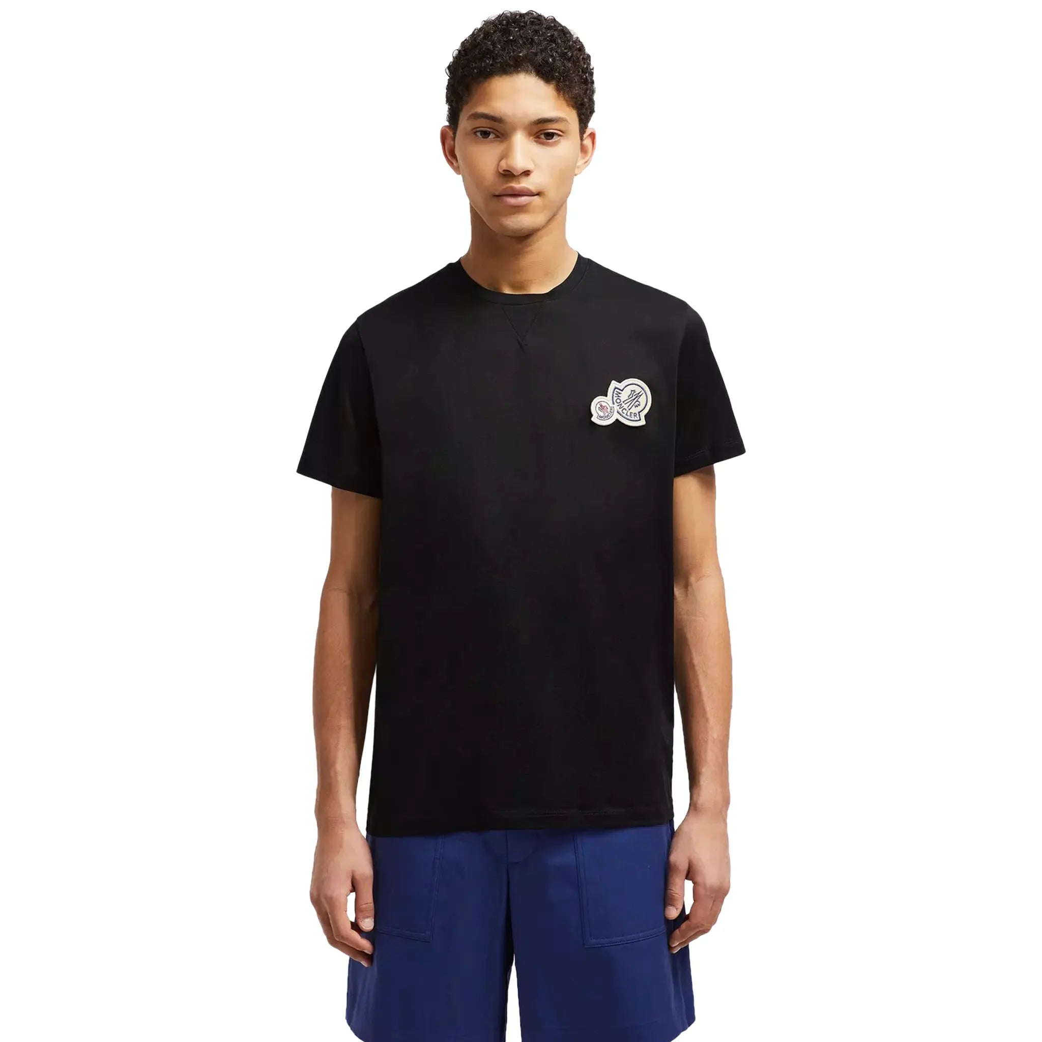 Model front view of Moncler Double Bell Logo Black T Shirt J10918C000588390Y999