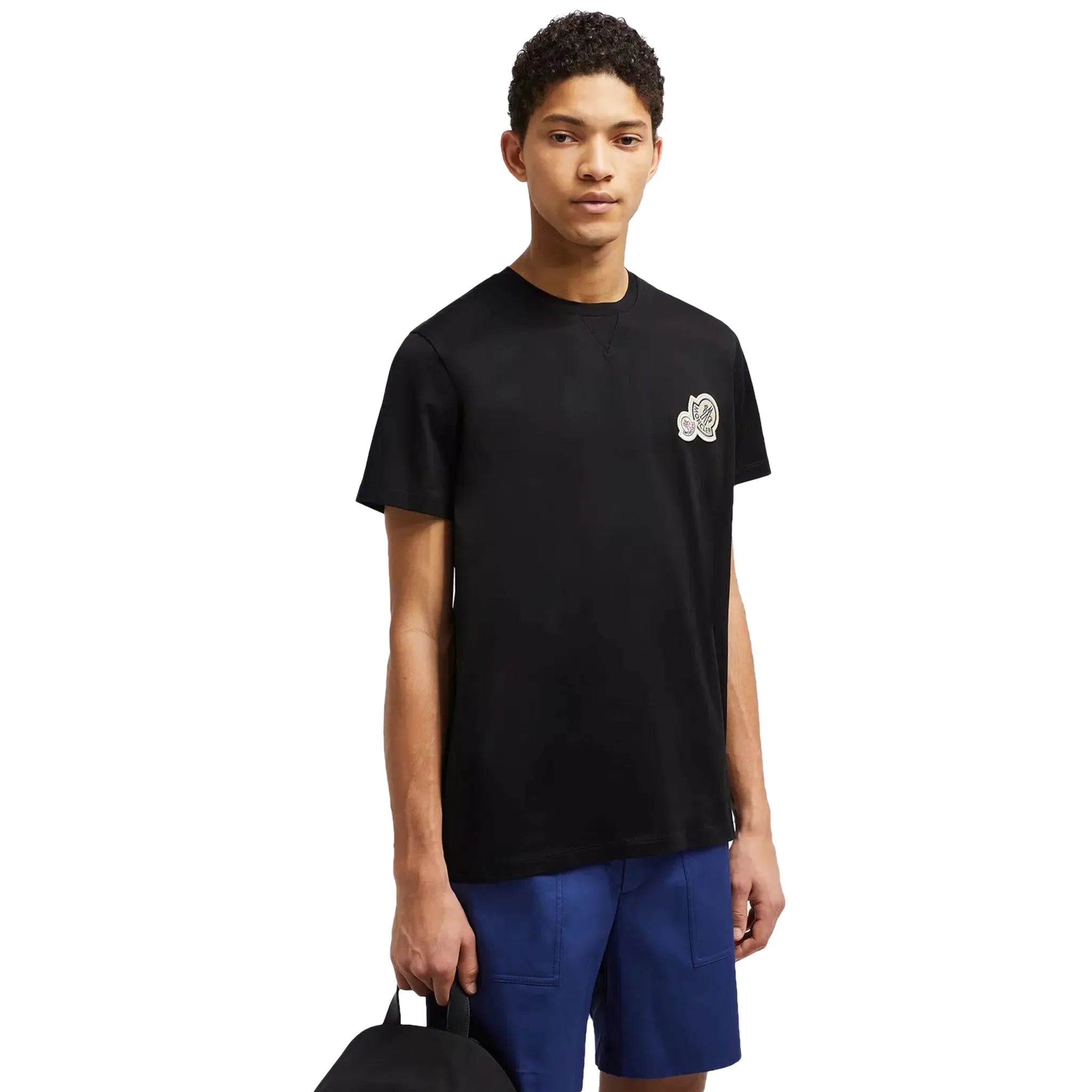 Model front side view of Moncler Double Bell Logo Black T Shirt J10918C000588390Y999