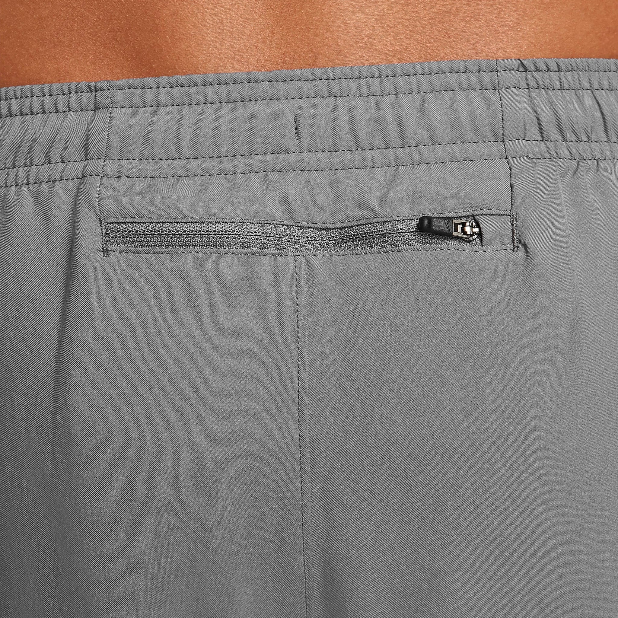 Model back view of Nike Challenger Grey Pants DD4895-084