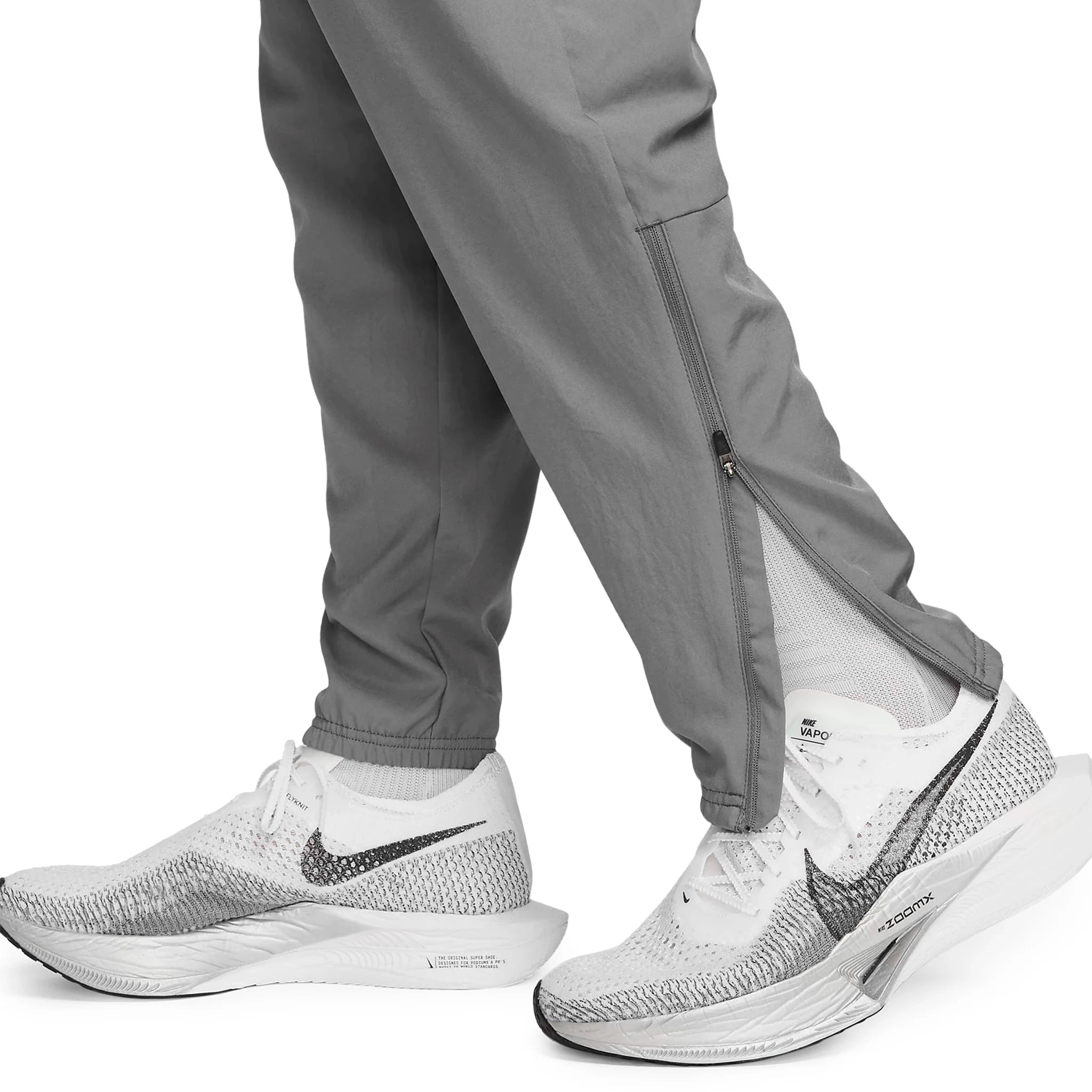 Model leg view of Nike Challenger Grey Pants DD4895-084