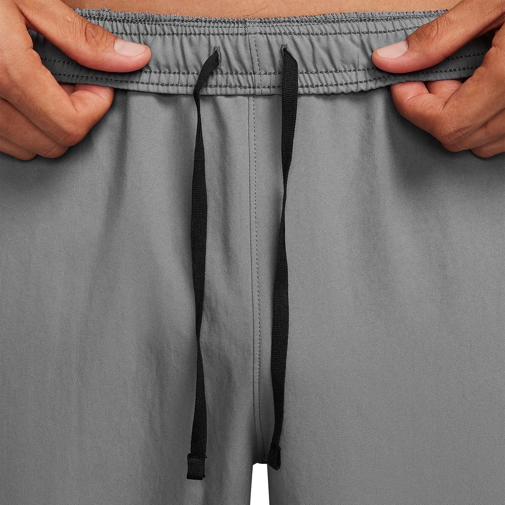 Model waist view of Nike Challenger Grey Pants DD4895-084