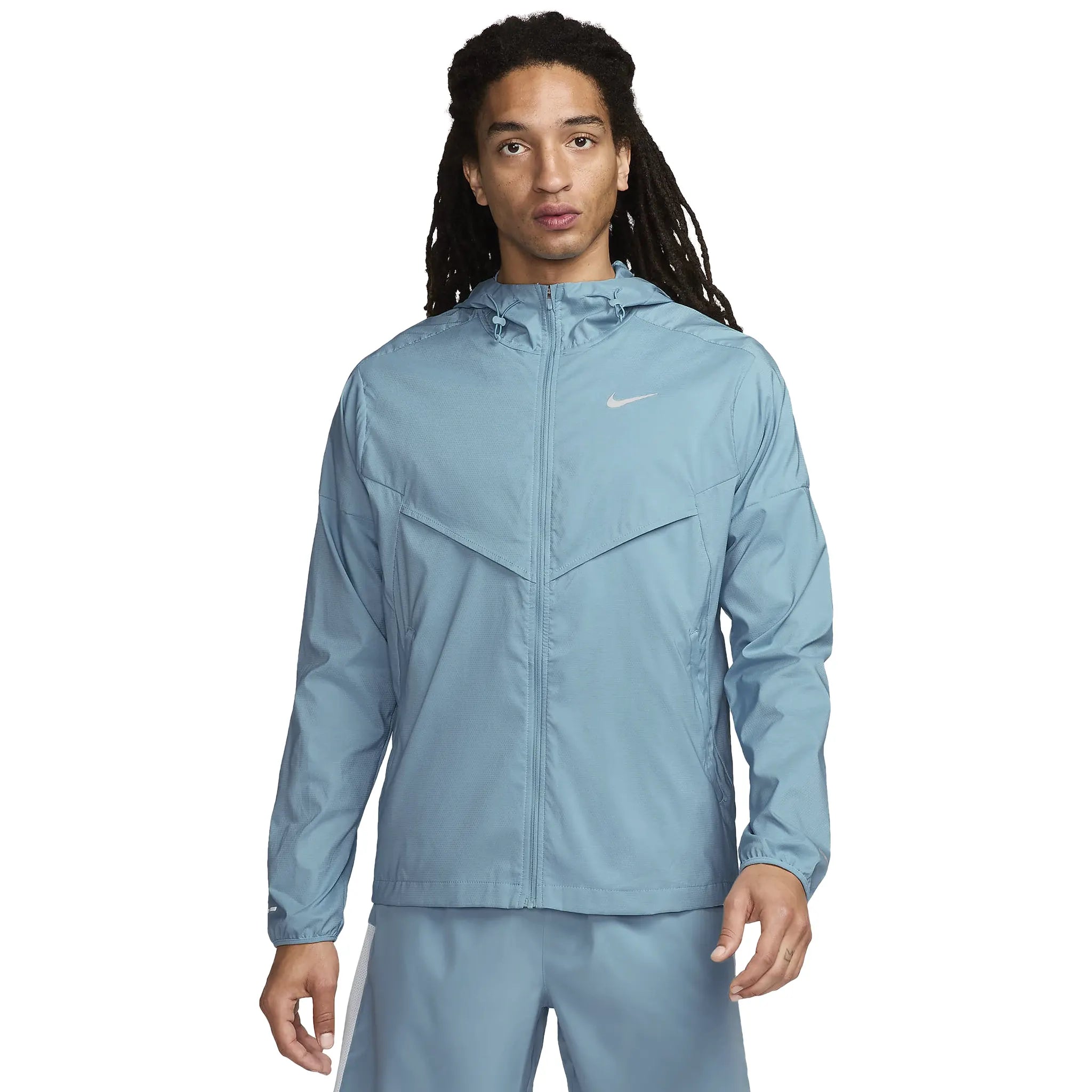 Model front view of Nike Denim Turquoise Windrunner Jacket & Shorts FB7511-464 | FJ7780-091