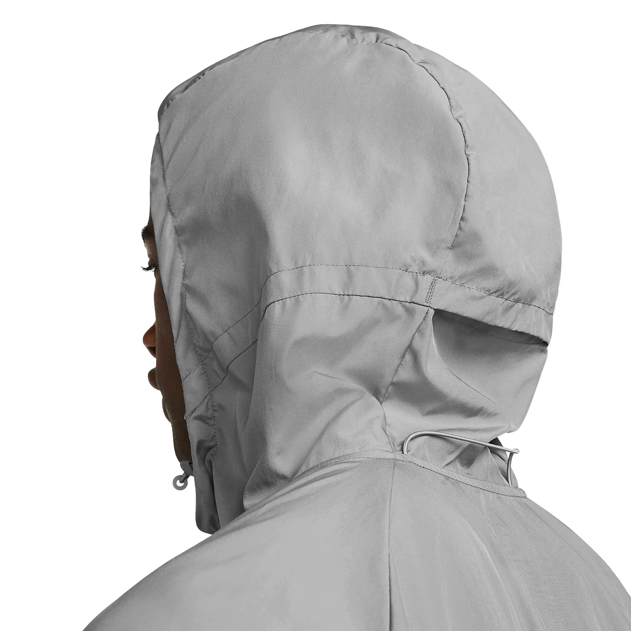 Model hood back view of Nike Miler Repel Grey Windbreaker