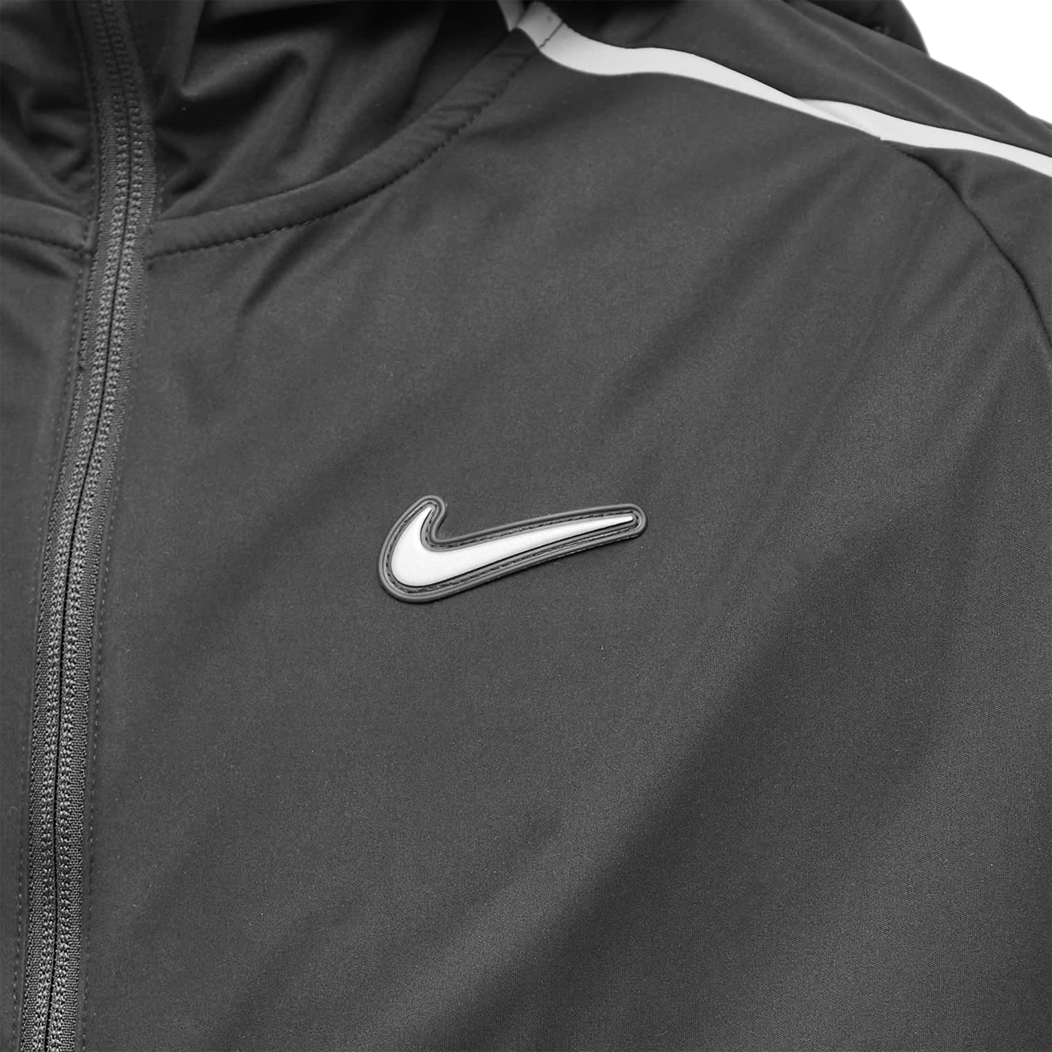 Model chest view of Nike x Nocta NRG Warmup Black Jacket DV3661-010